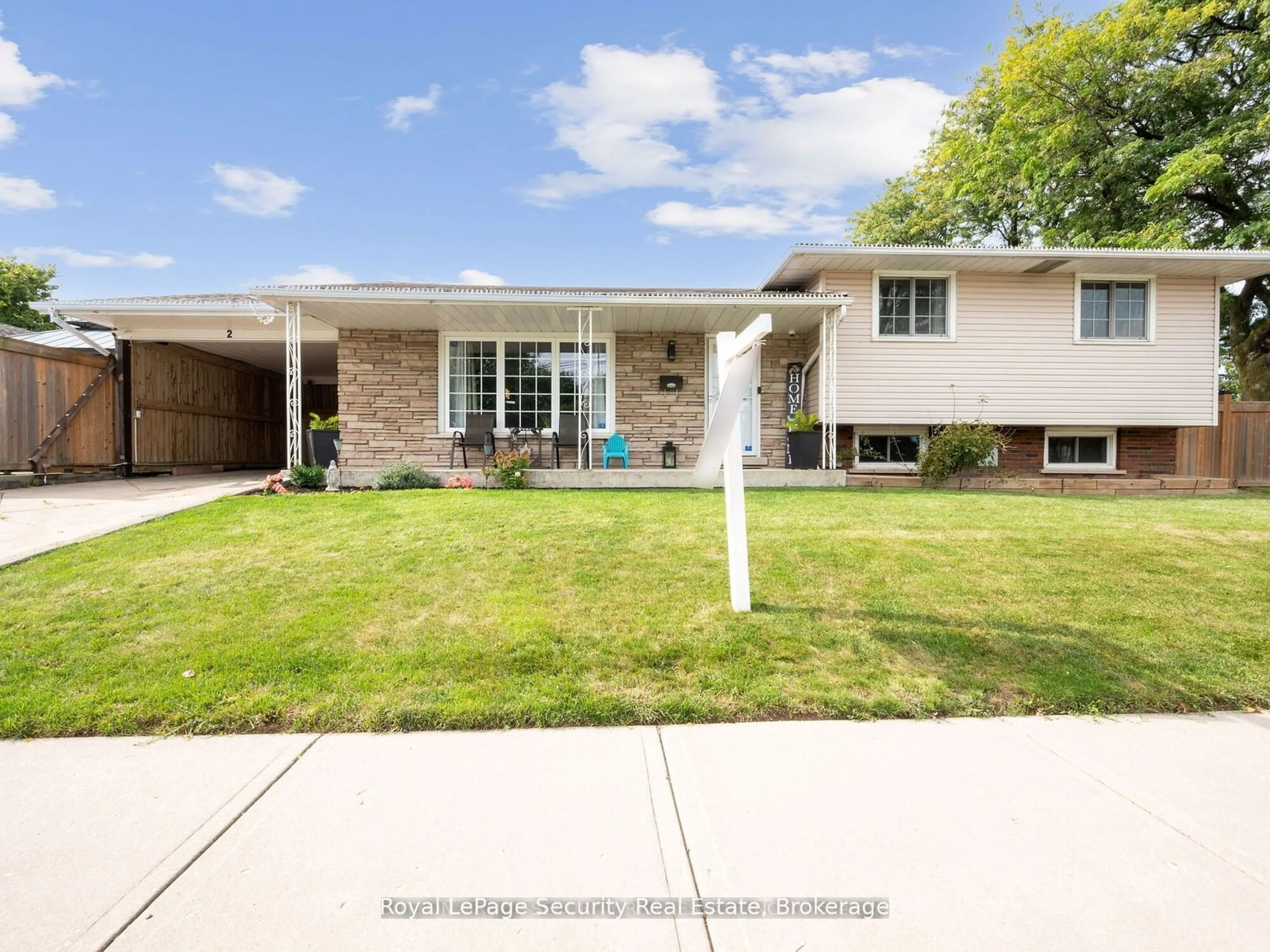 Frontside or backside of a home, the street view for 2 Maitland Ave, Hamilton Ontario L9A 3J3