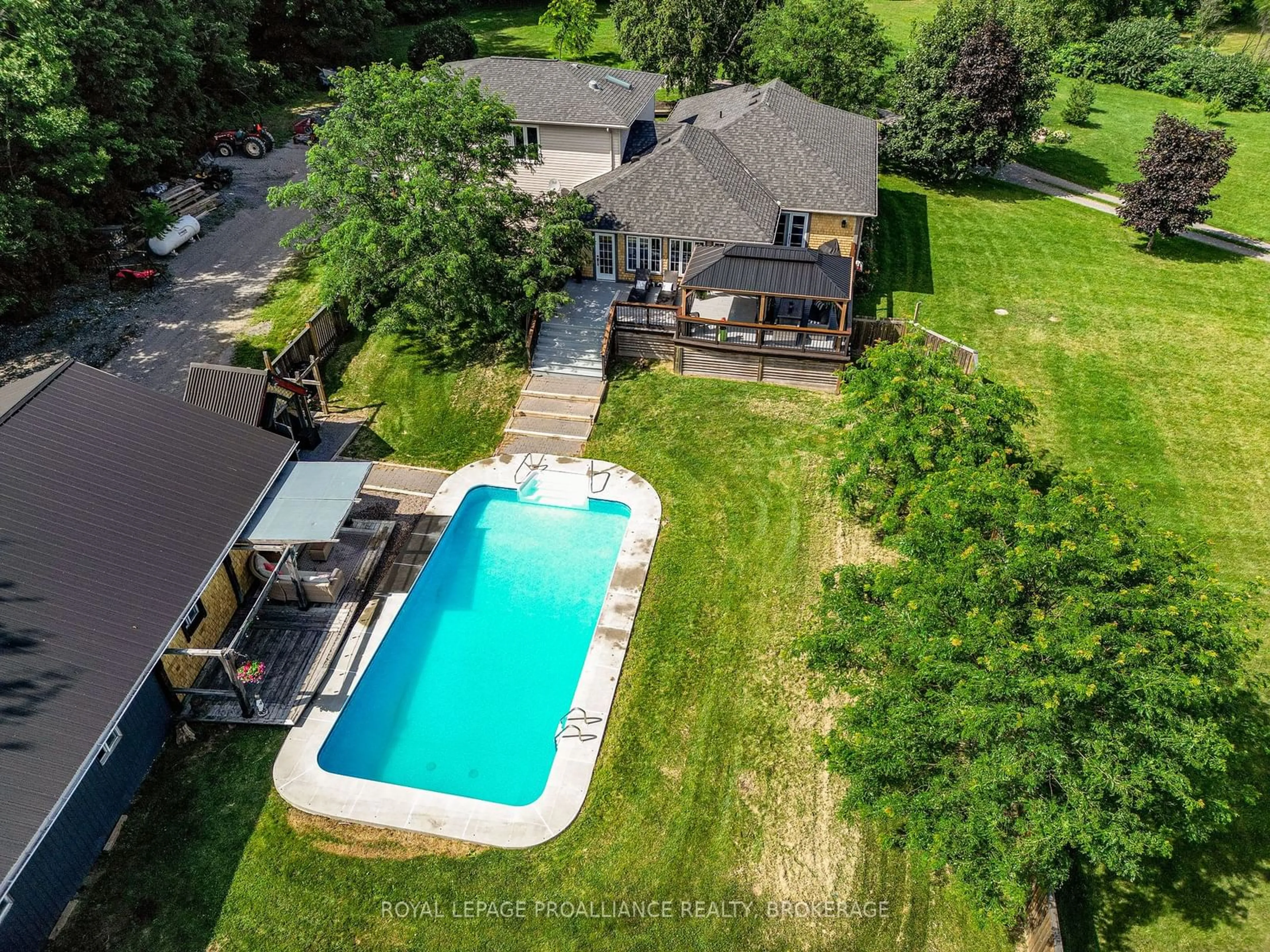 Frontside or backside of a home, the fenced backyard for 4422 Highway 15, Kingston Ontario K0H 2N0