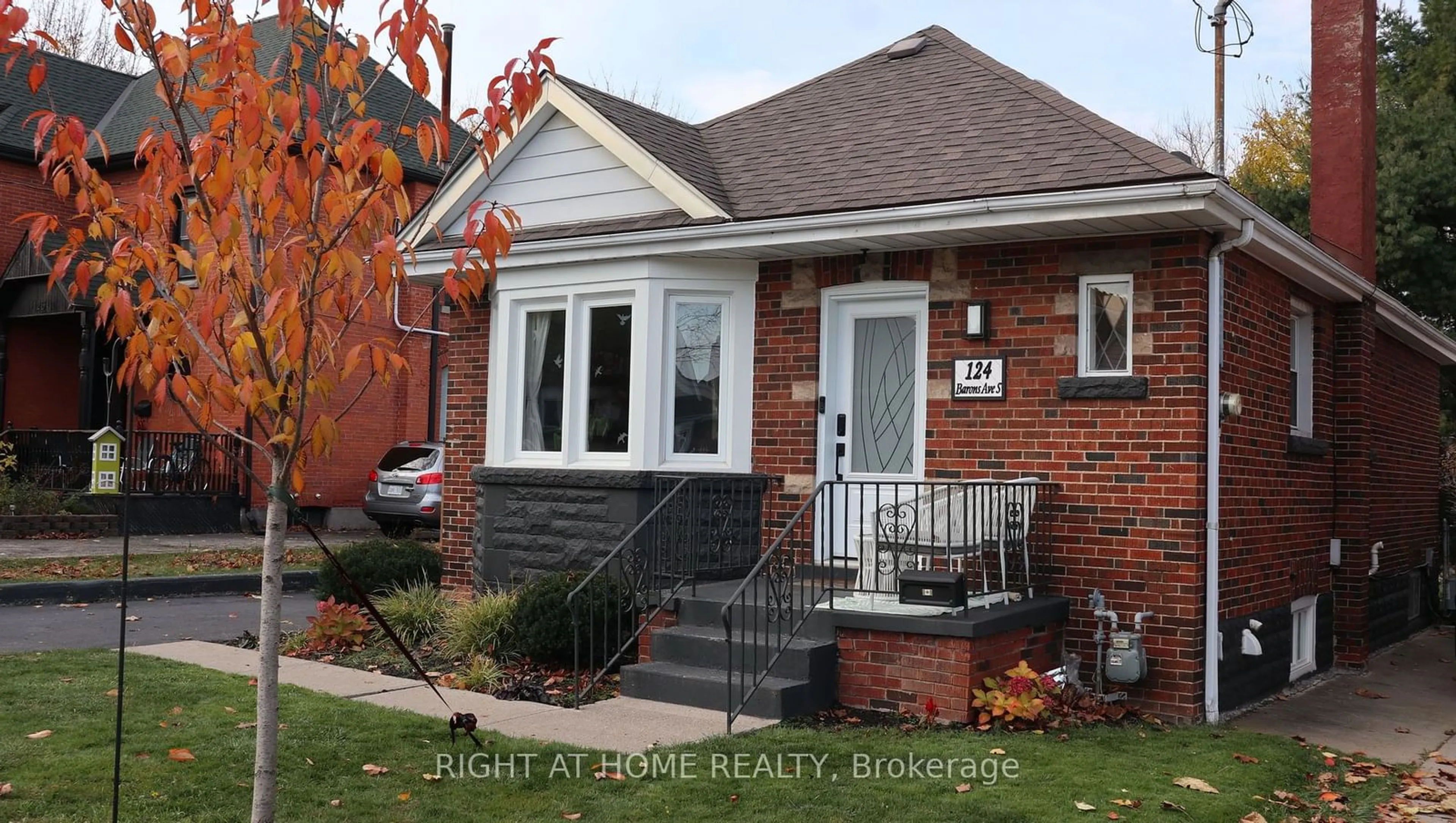 Home with brick exterior material for 124 Barons Ave, Hamilton Ontario L8K 2Y7