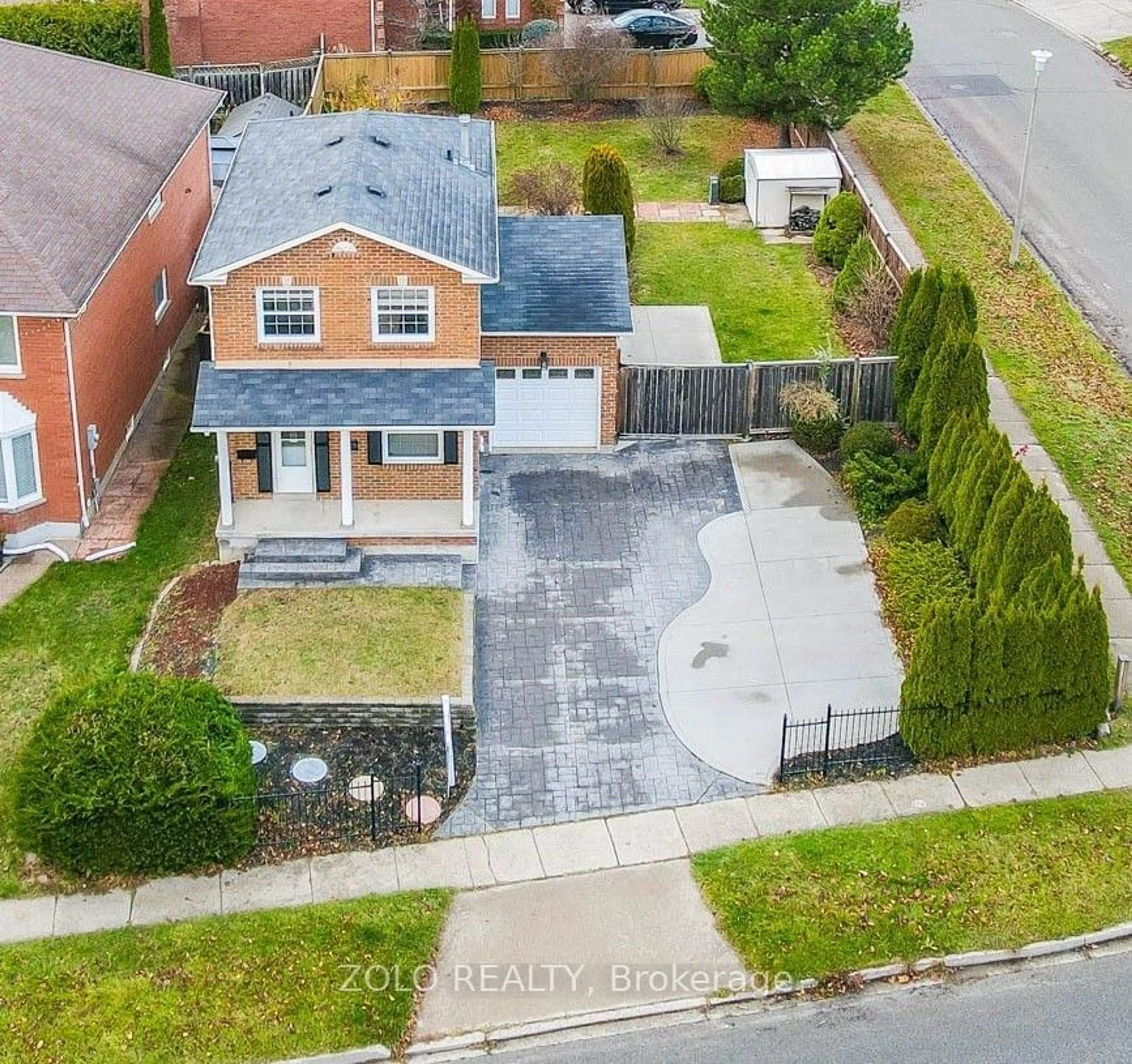 Frontside or backside of a home, the fenced backyard for 371 Burnett Ave, Cambridge Ontario N1T 1G6