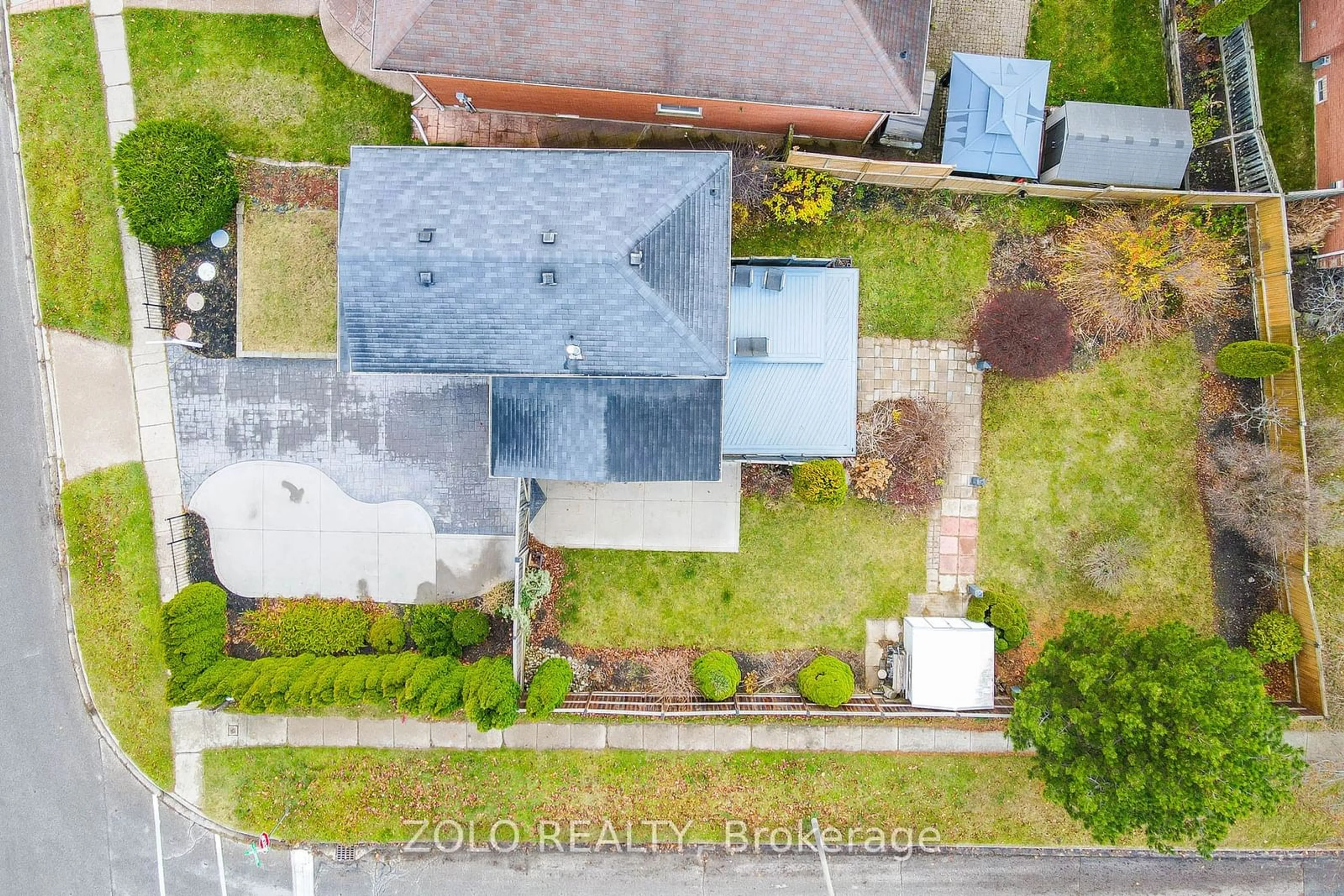 Frontside or backside of a home, the fenced backyard for 371 Burnett Ave, Cambridge Ontario N1T 1G6