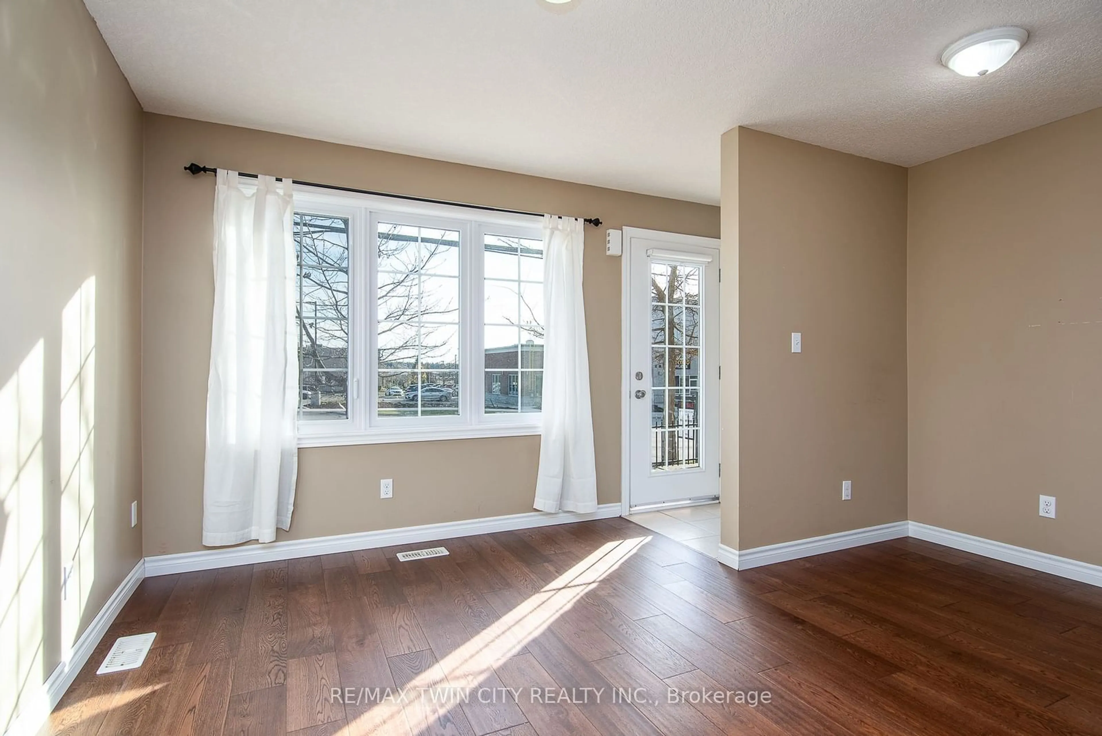 A pic of a room, wood floors for 756 Bleams Rd #A, Kitchener Ontario N2E 0E4