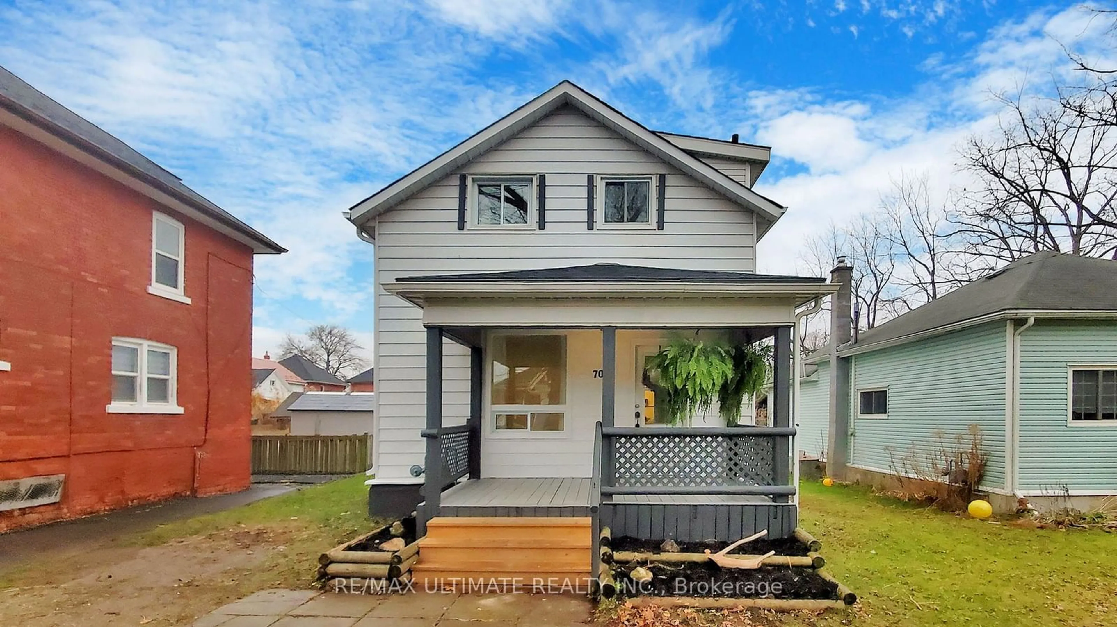 Frontside or backside of a home, the fenced backyard for 70 Argyle St, Stratford Ontario N5A 2H5