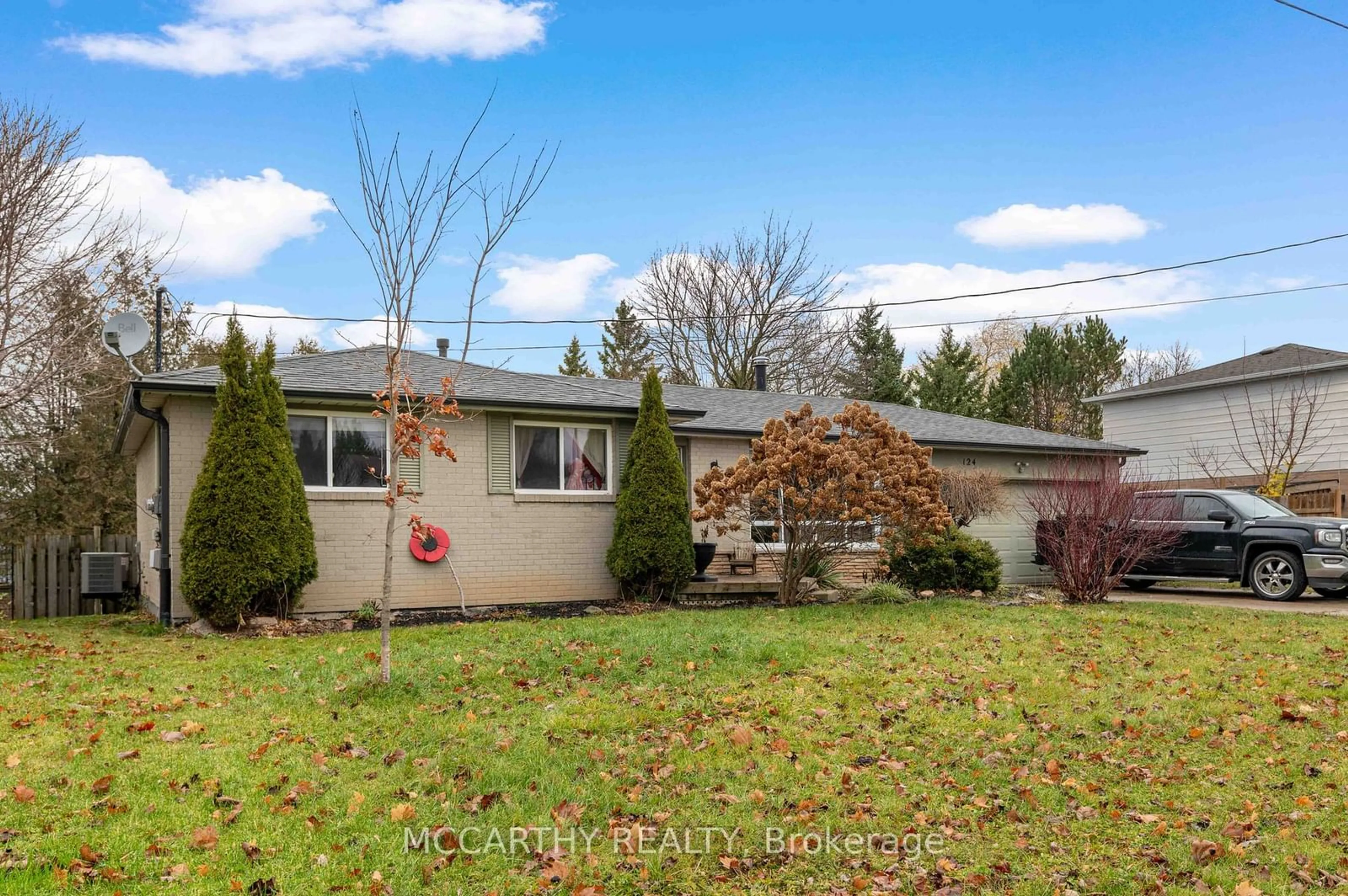 Frontside or backside of a home, the fenced backyard for 124 Muriel St, Shelburne Ontario L0N 1S1