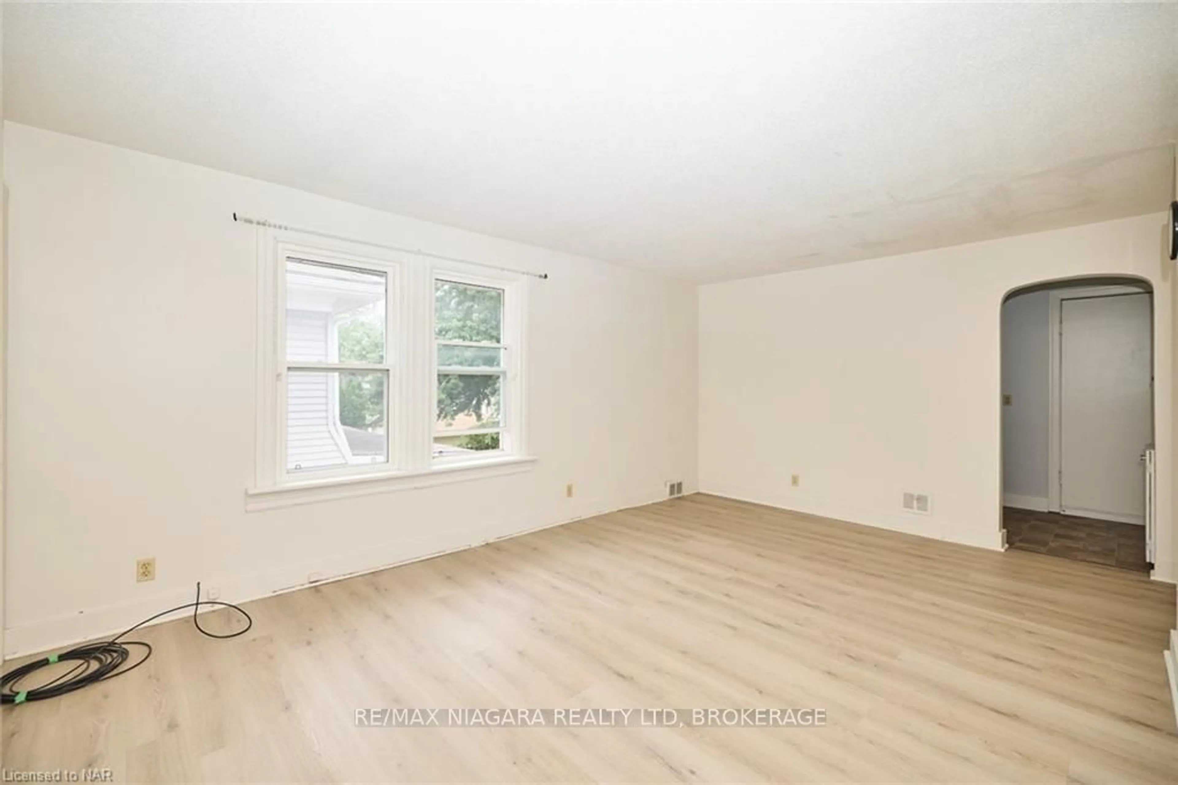 A pic of a room, wood floors for 4889 Mcrae St, Niagara Falls Ontario L2E 1N9