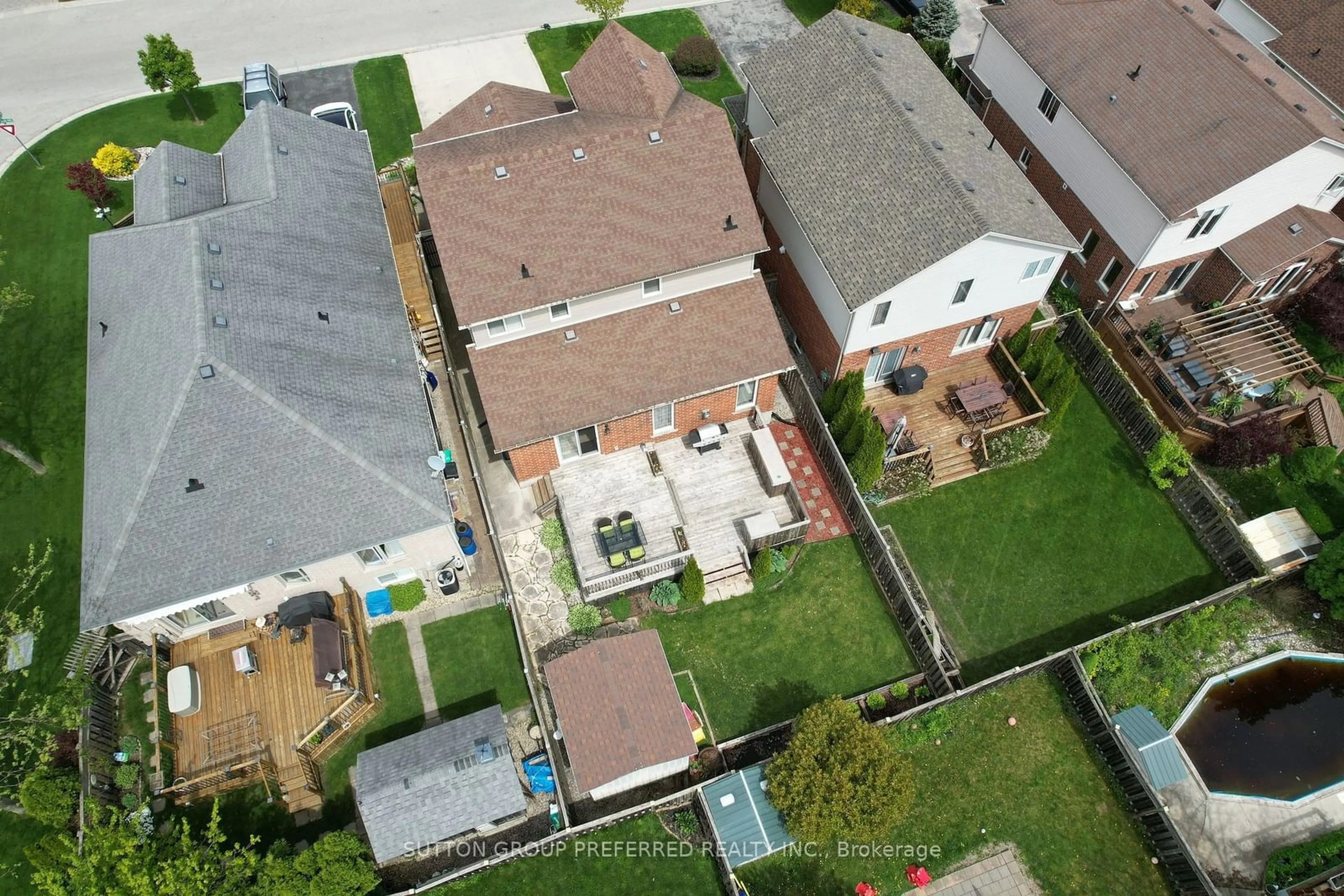 Frontside or backside of a home, the fenced backyard for 599 Garibaldi Ave, London Ontario N5X 4R6