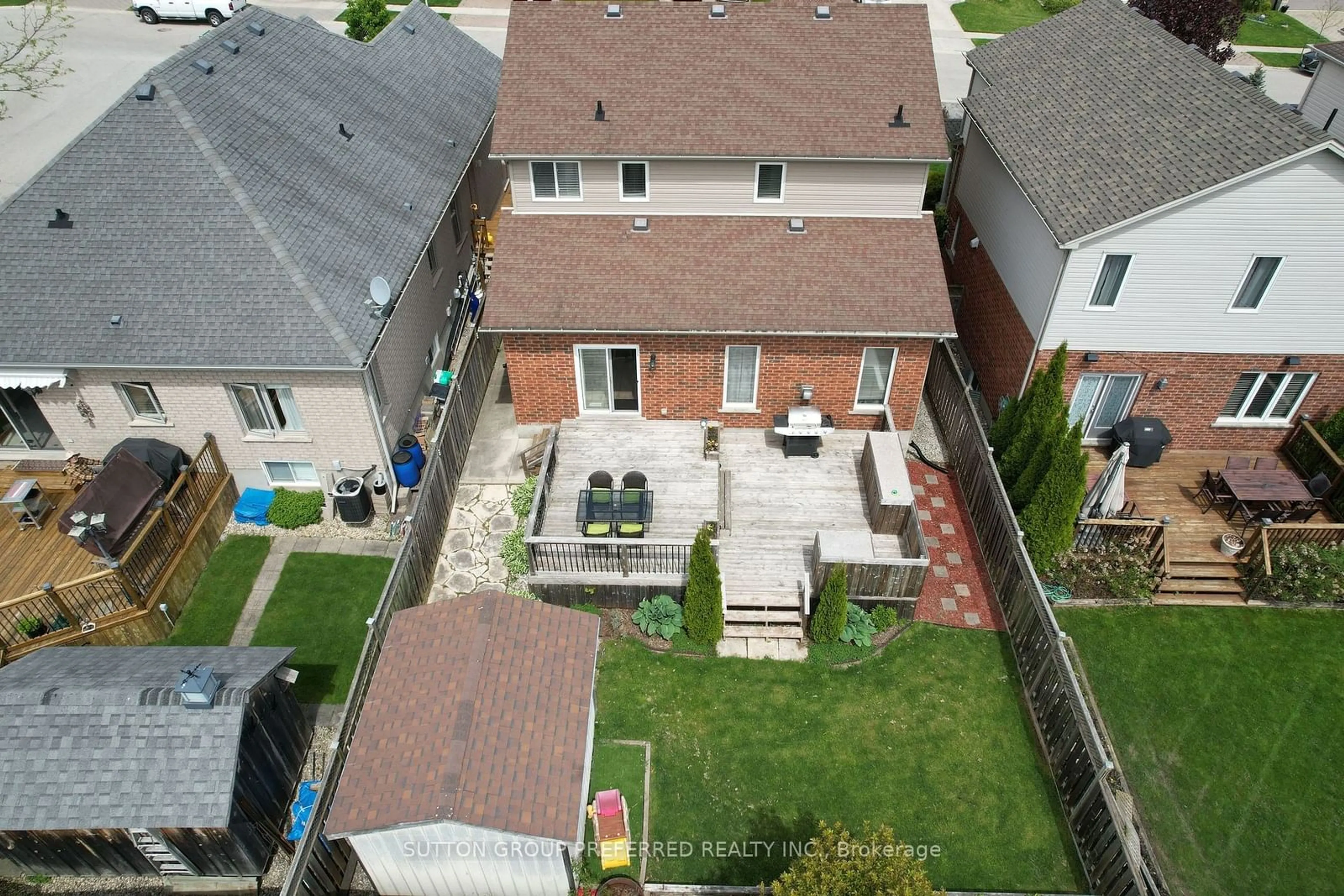 Frontside or backside of a home, the fenced backyard for 599 Garibaldi Ave, London Ontario N5X 4R6