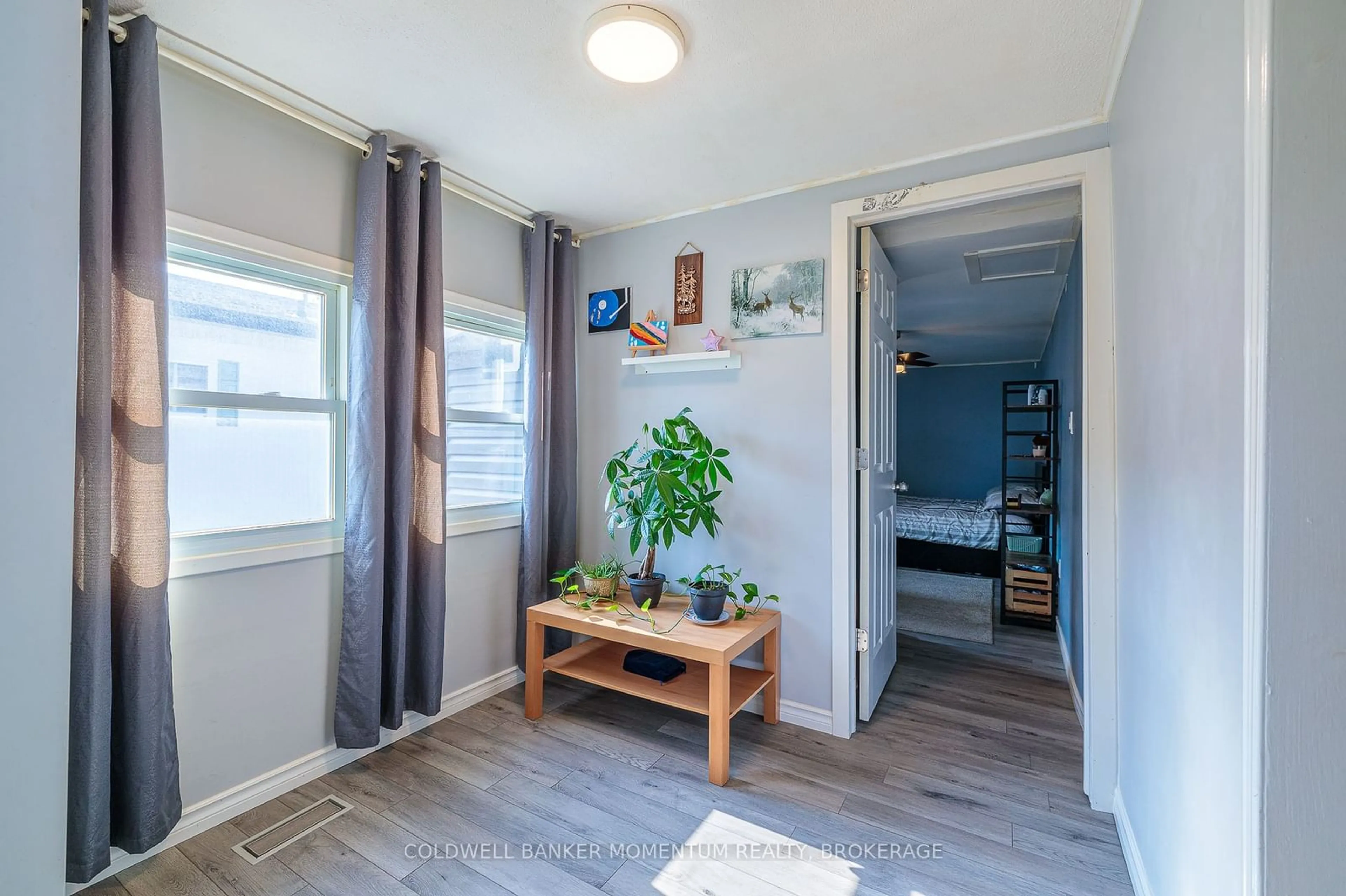 A pic of a room, wood floors for 4592 Martha Lane, Lincoln Ontario L3J 0W1