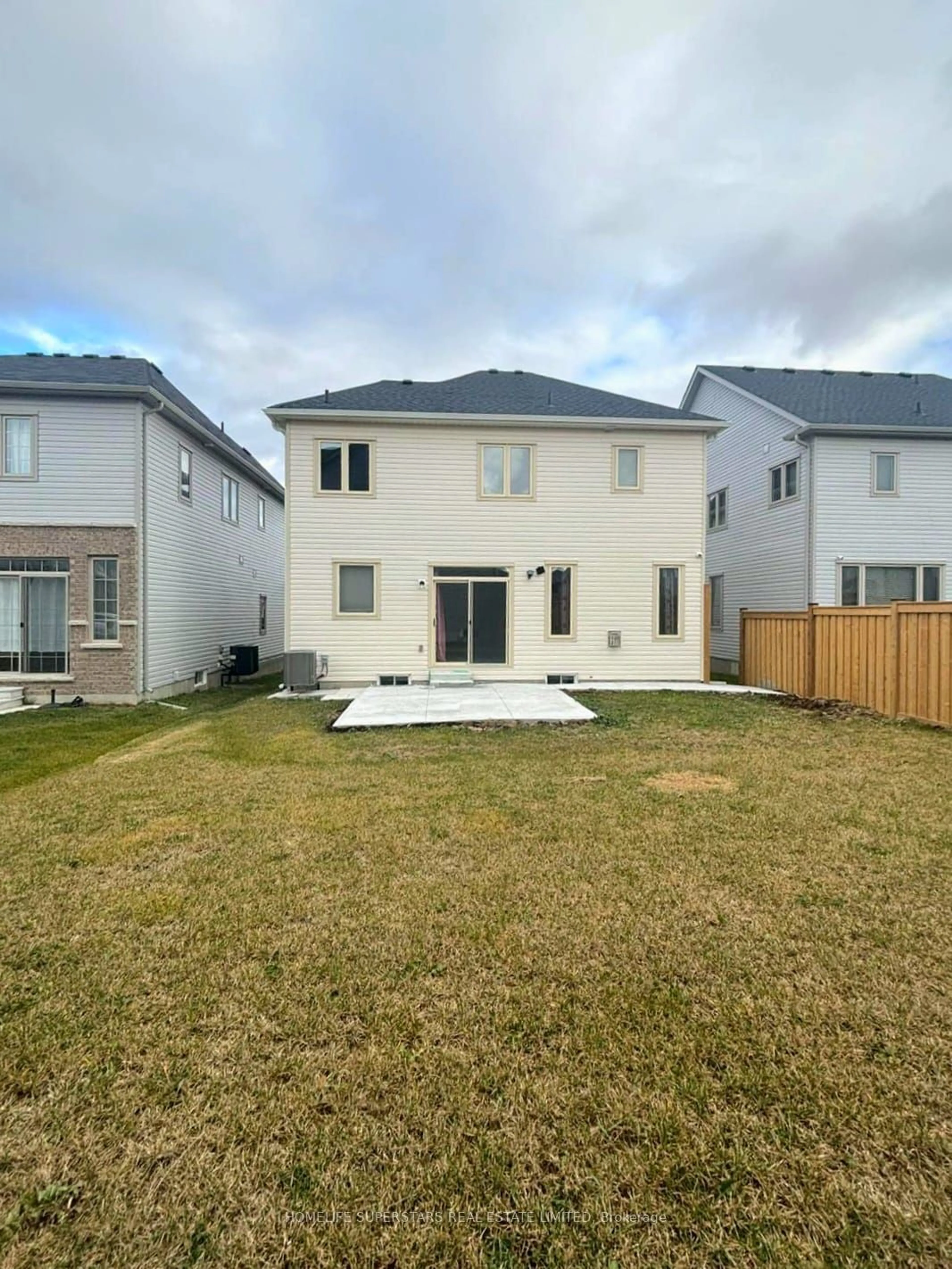 Frontside or backside of a home, the fenced backyard for 9 Hennessey Cres, Kawartha Lakes Ontario K9V 0P2