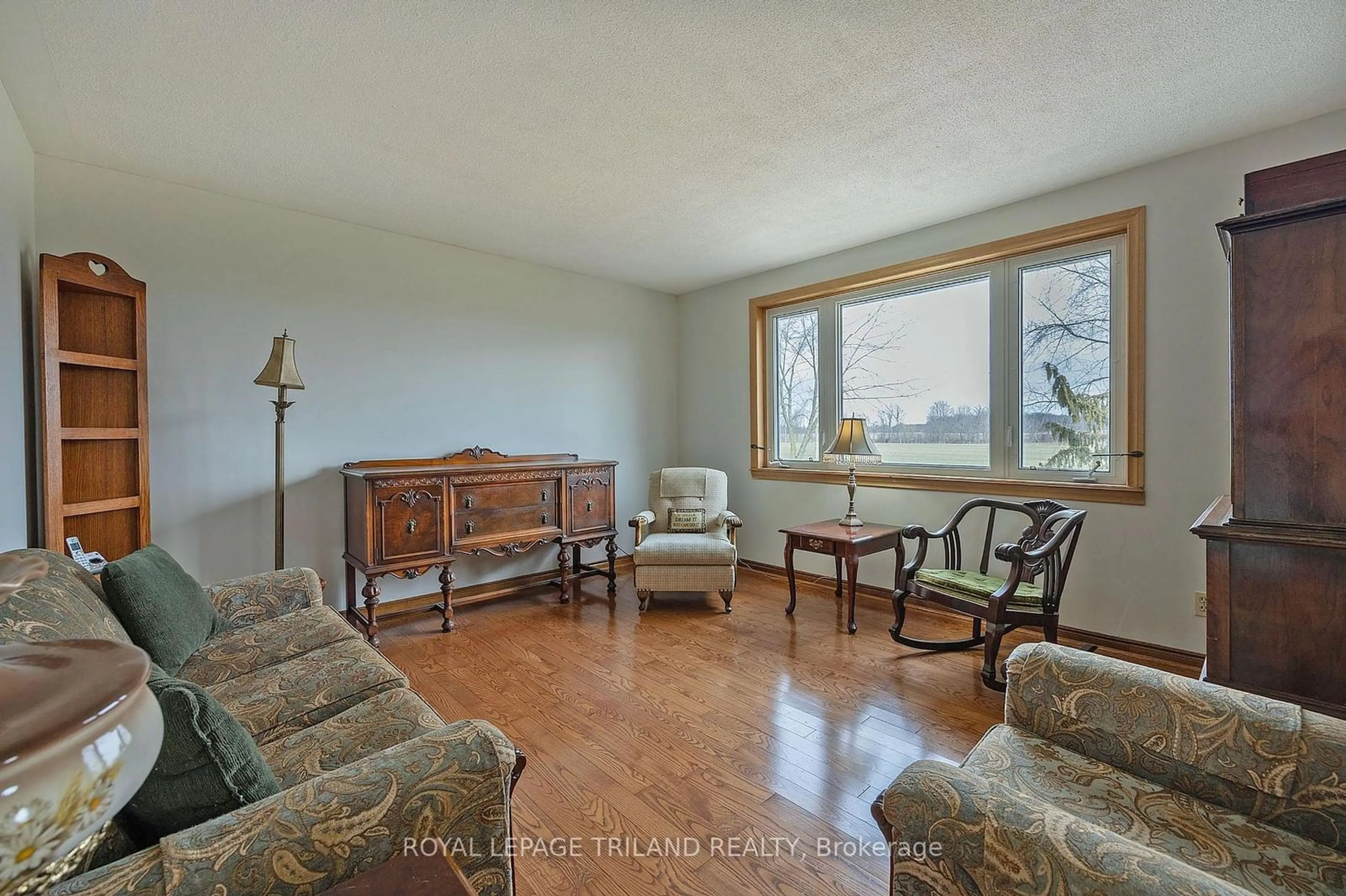 Living room, wood floors for 21217 TAITS Rd, Southwest Middlesex Ontario N0L 1M0