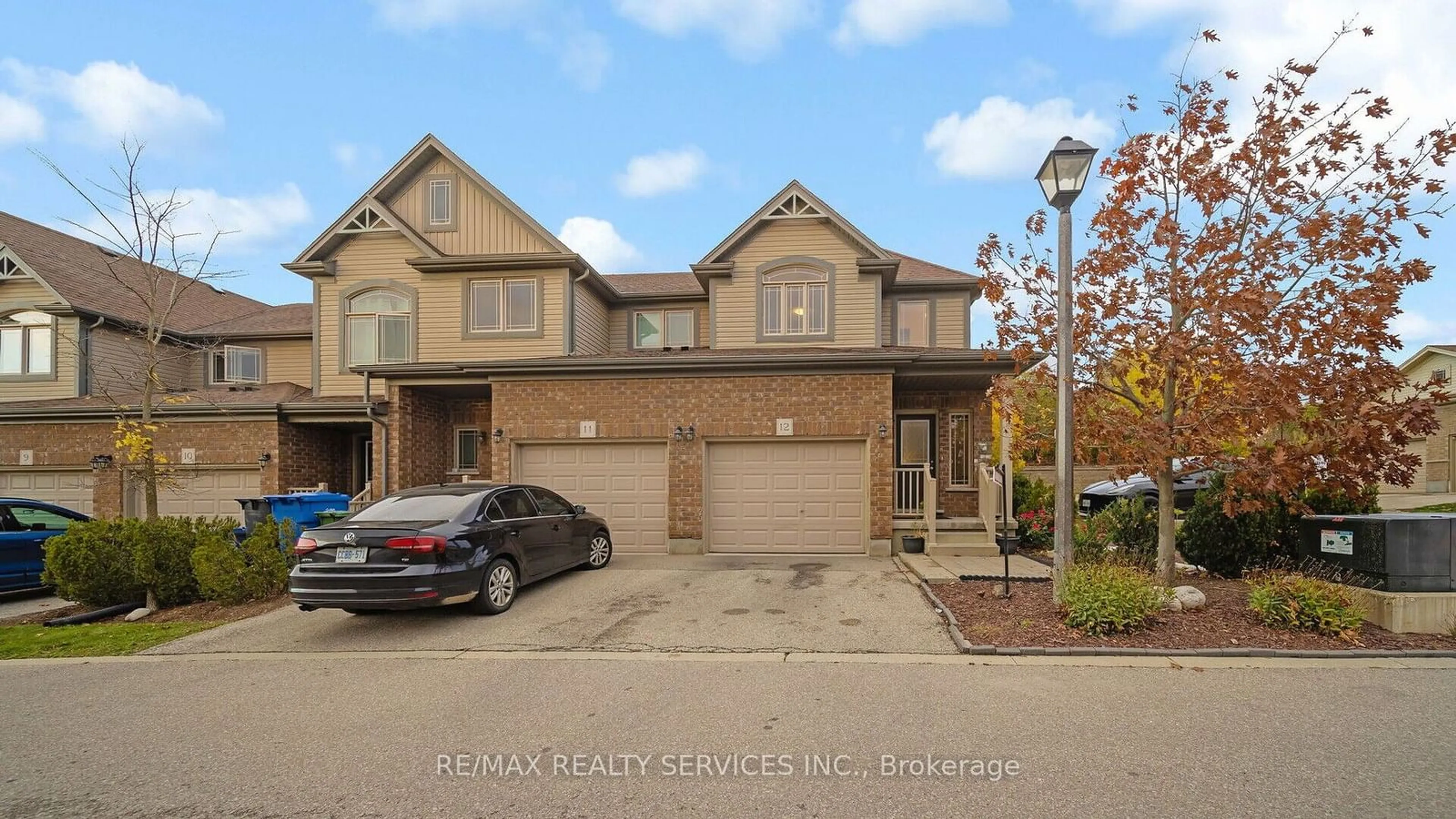 A pic from exterior of the house or condo, the street view for 14 Amos Dr #12, Guelph Ontario N1L 0M2