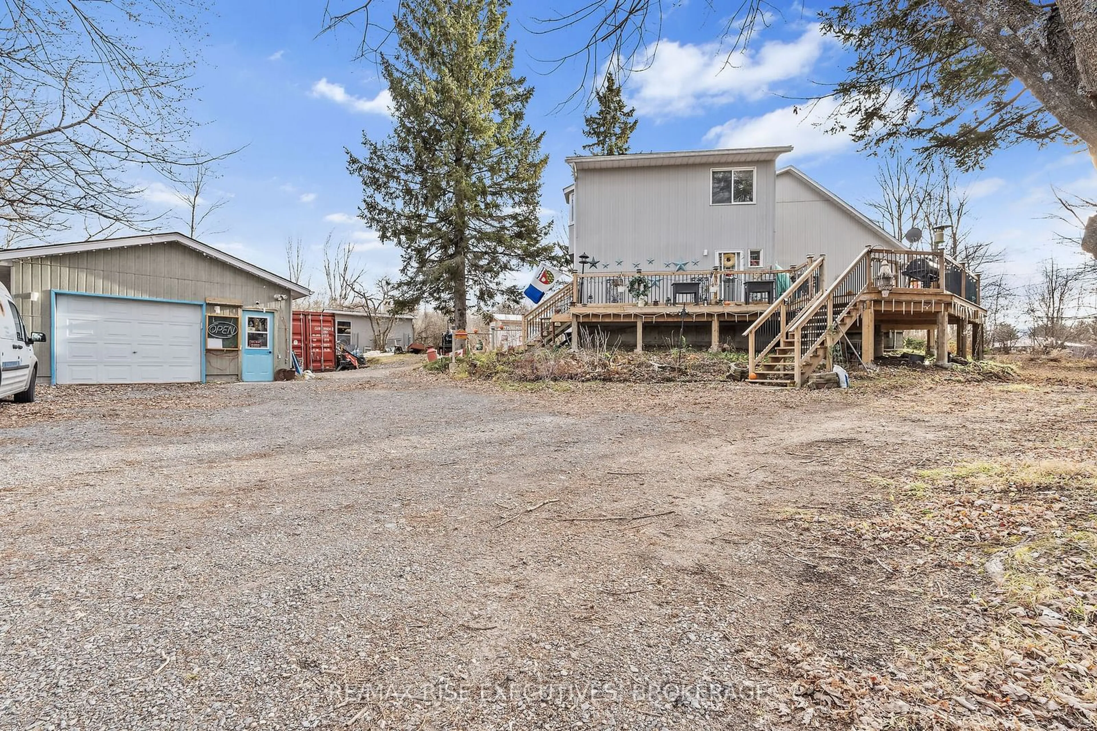 A pic from exterior of the house or condo, the fenced backyard for 2800 Highway 15, Rideau Lakes Ontario K0G 1V0