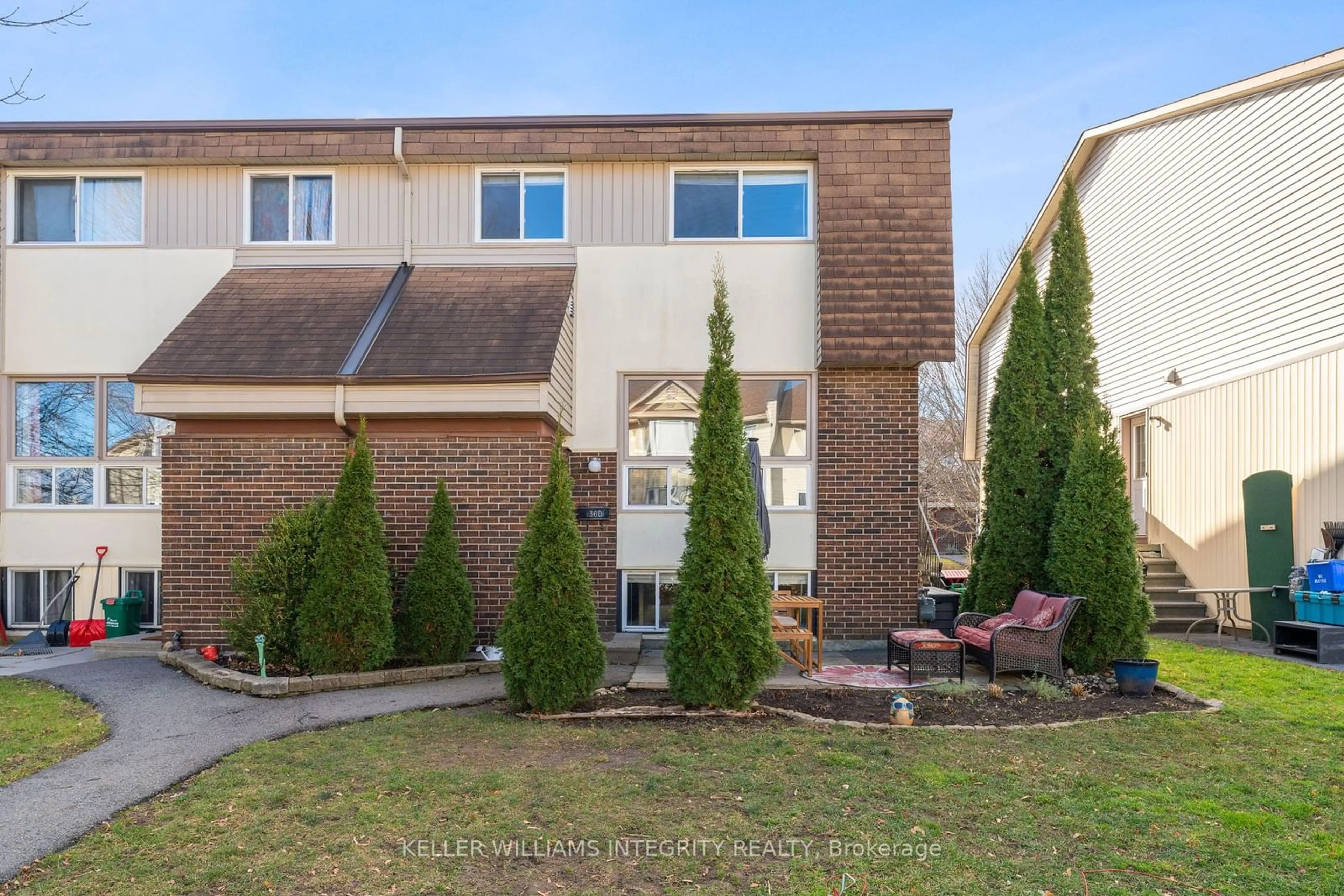 A pic from exterior of the house or condo, the fenced backyard for 36D Forester Cres #210, Bells Corners and South to Fallowfield Ontario K2H 8Y2