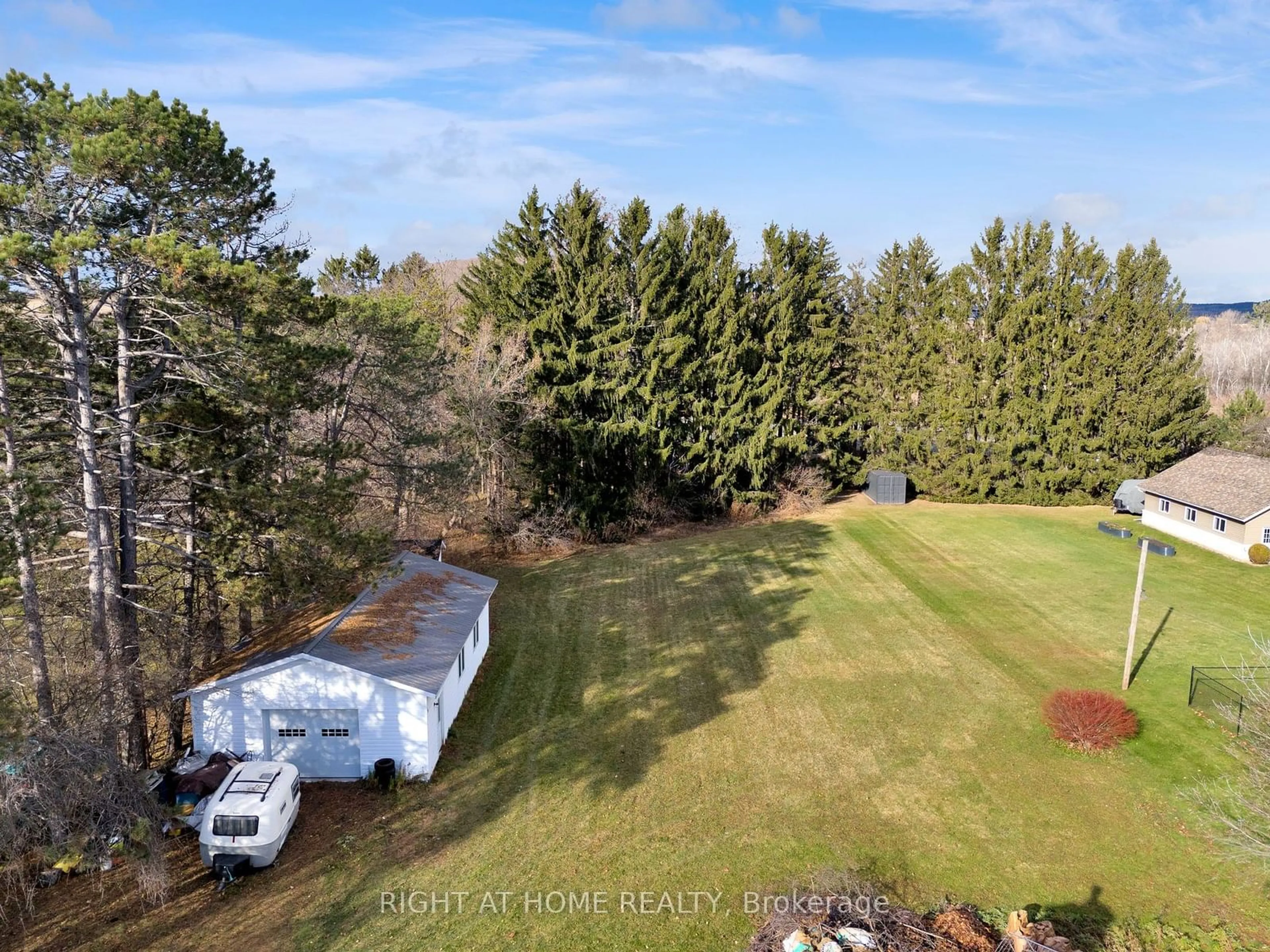 Frontside or backside of a home, the fenced backyard for 62 Molson St, Port Hope Ontario L1A 2J9