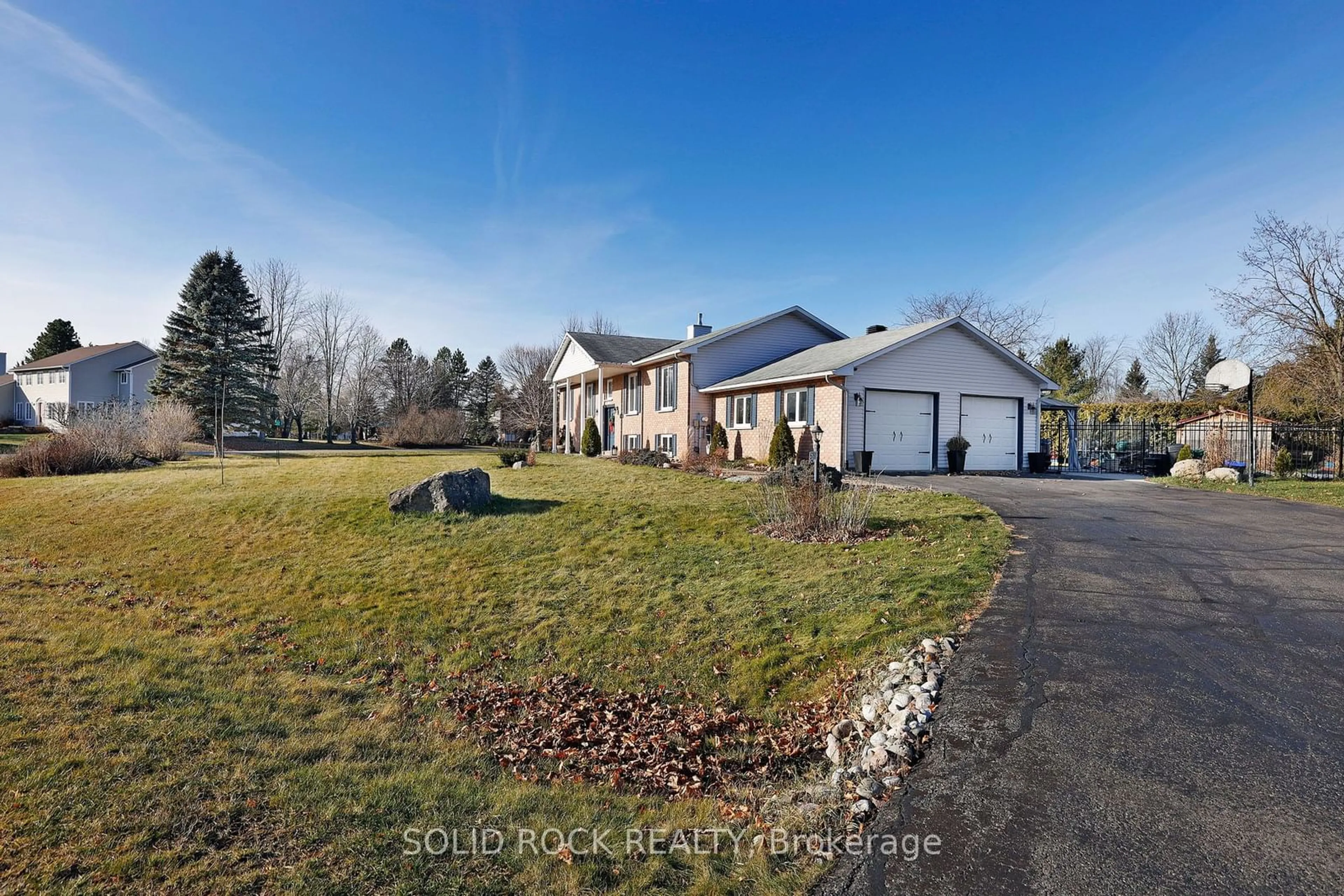 Frontside or backside of a home, the fenced backyard for 5761 Osgoode Ridge Rd, Greely - Metcalfe - Osgoode - Vernon and Area Ontario K0A 2W0