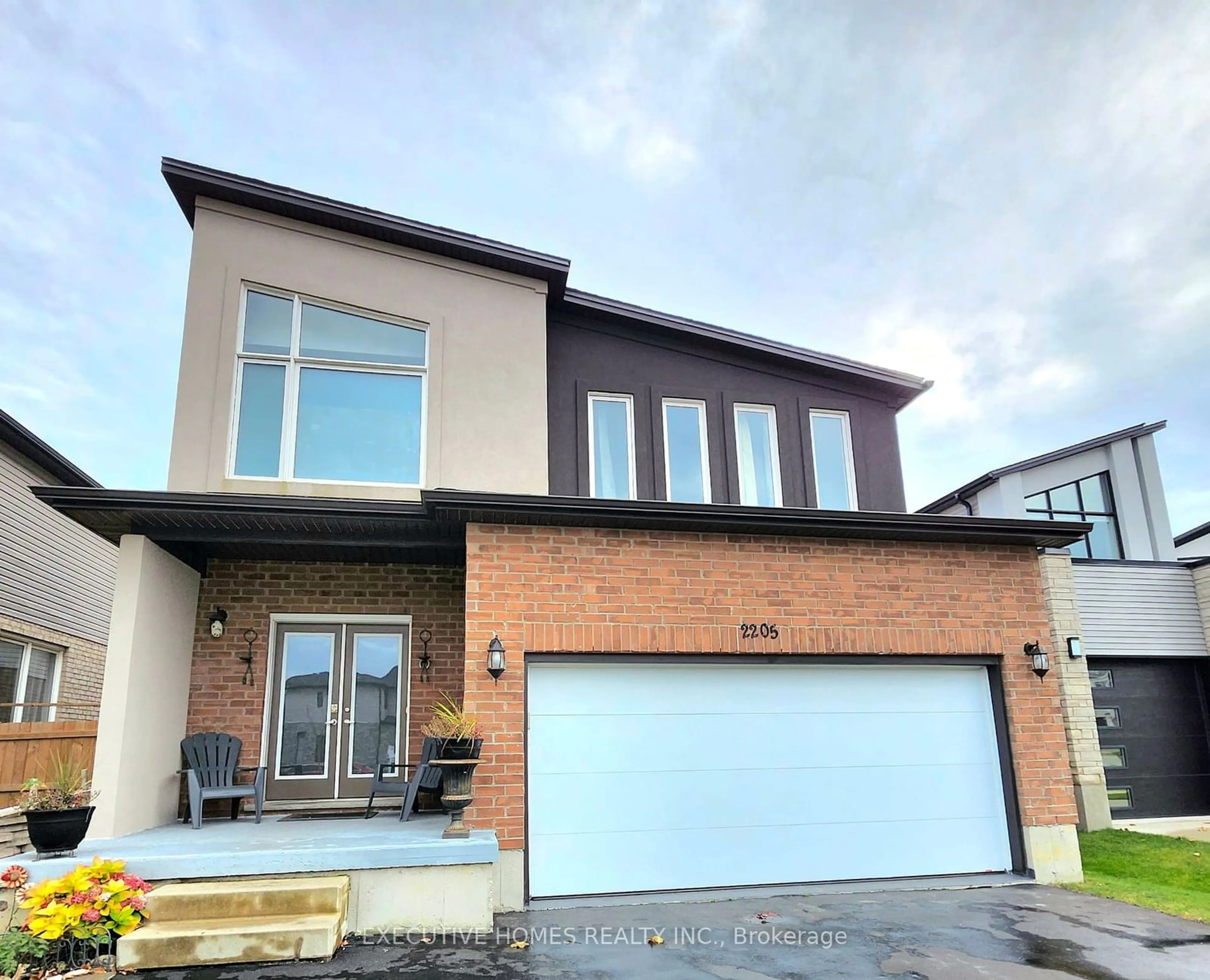 Frontside or backside of a home, the street view for 2205 Wateroak Dr, London Ontario N6G 5B4