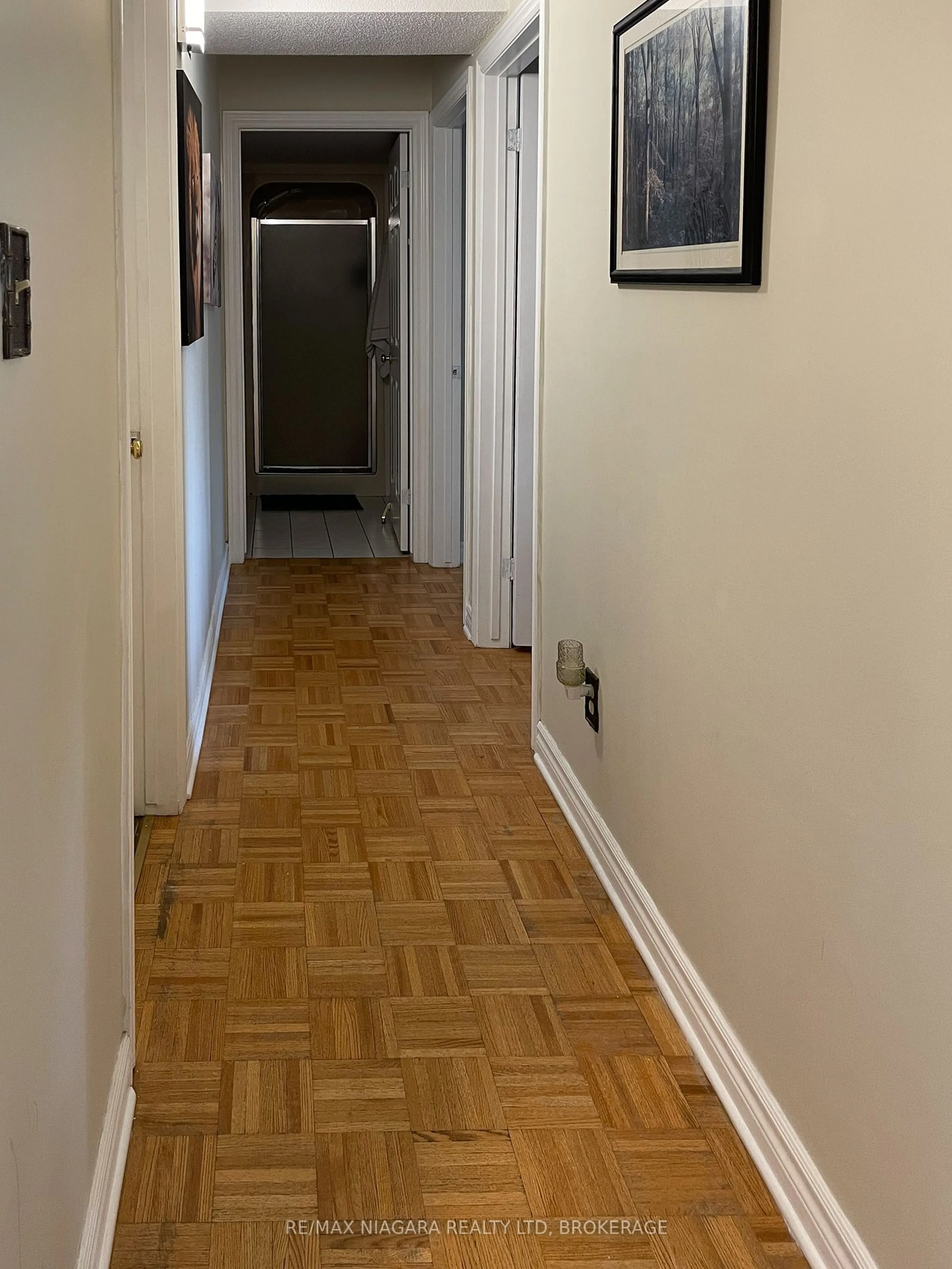 A pic of a room, wood floors for 3364 Montrose Rd #201, Niagara Falls Ontario L2E 6S4