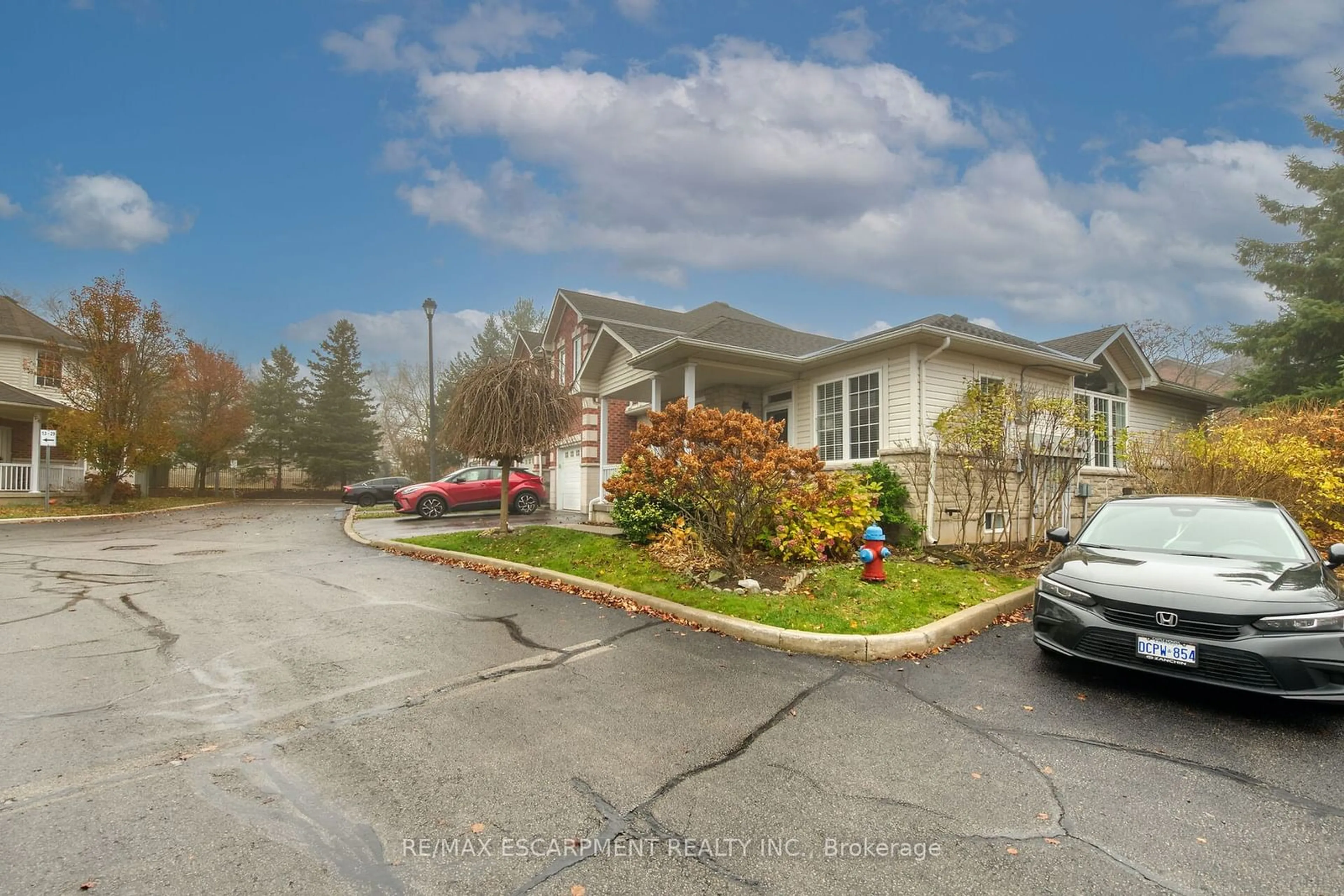 A pic from exterior of the house or condo, the street view for 81 Valridge Dr #8, Hamilton Ontario L9G 5B7