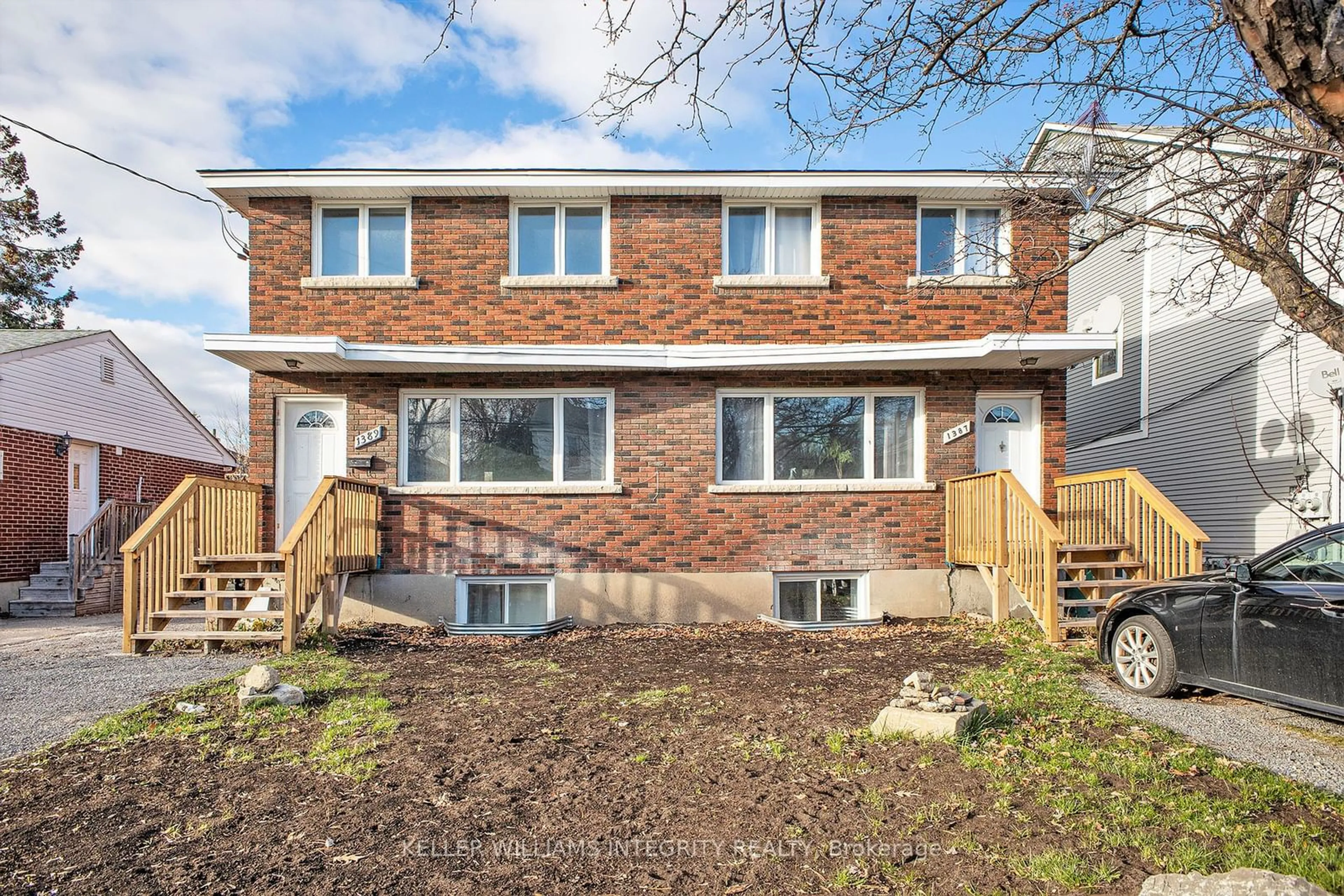 A pic from exterior of the house or condo, the fenced backyard for 1387/89 Raven Ave, Carlington - Central Park Ontario K1Z 7Y5