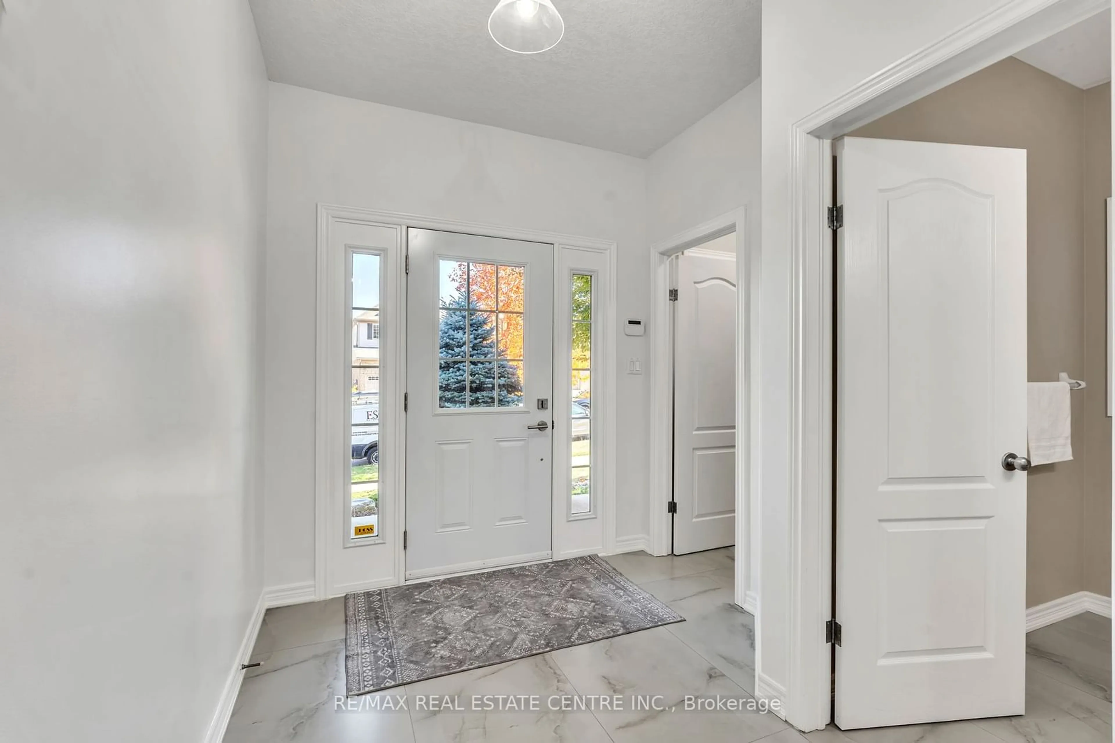 Indoor entryway, wood floors for 48 Isaiah Dr, Kitchener Ontario N2E 0B2