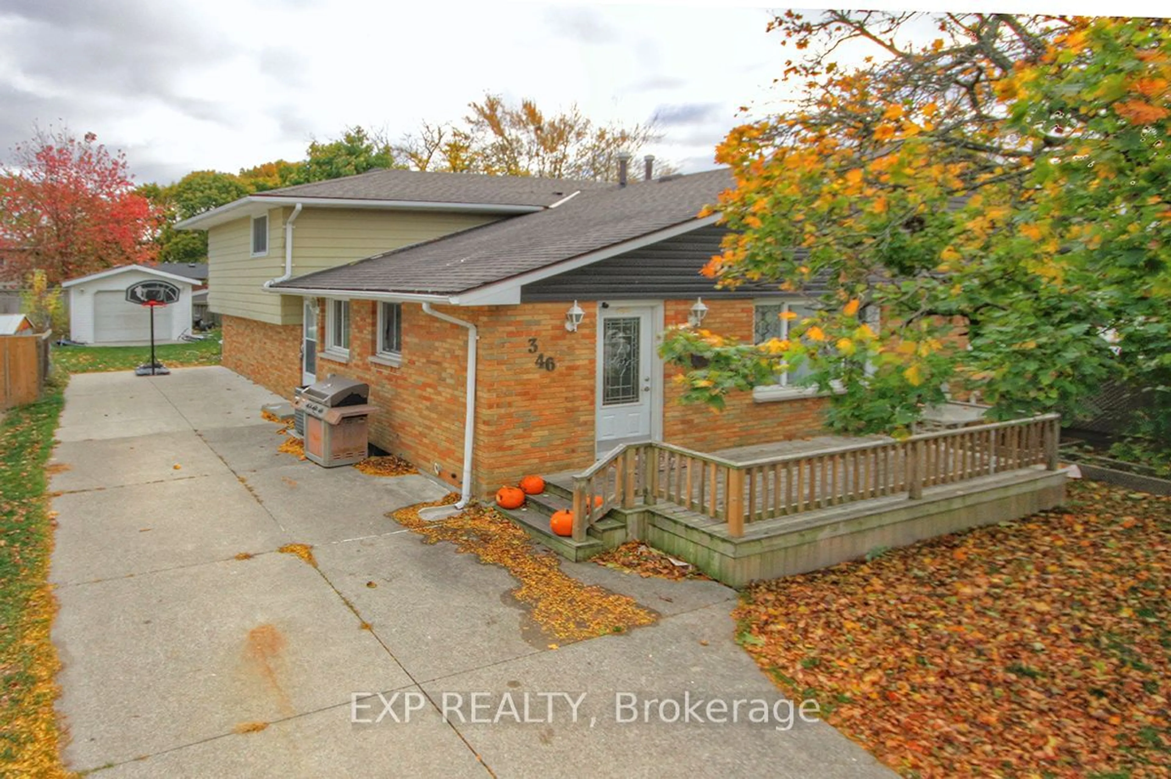 Frontside or backside of a home, the fenced backyard for 346 Trudeau Dr, Sarnia Ontario N7S 4K7