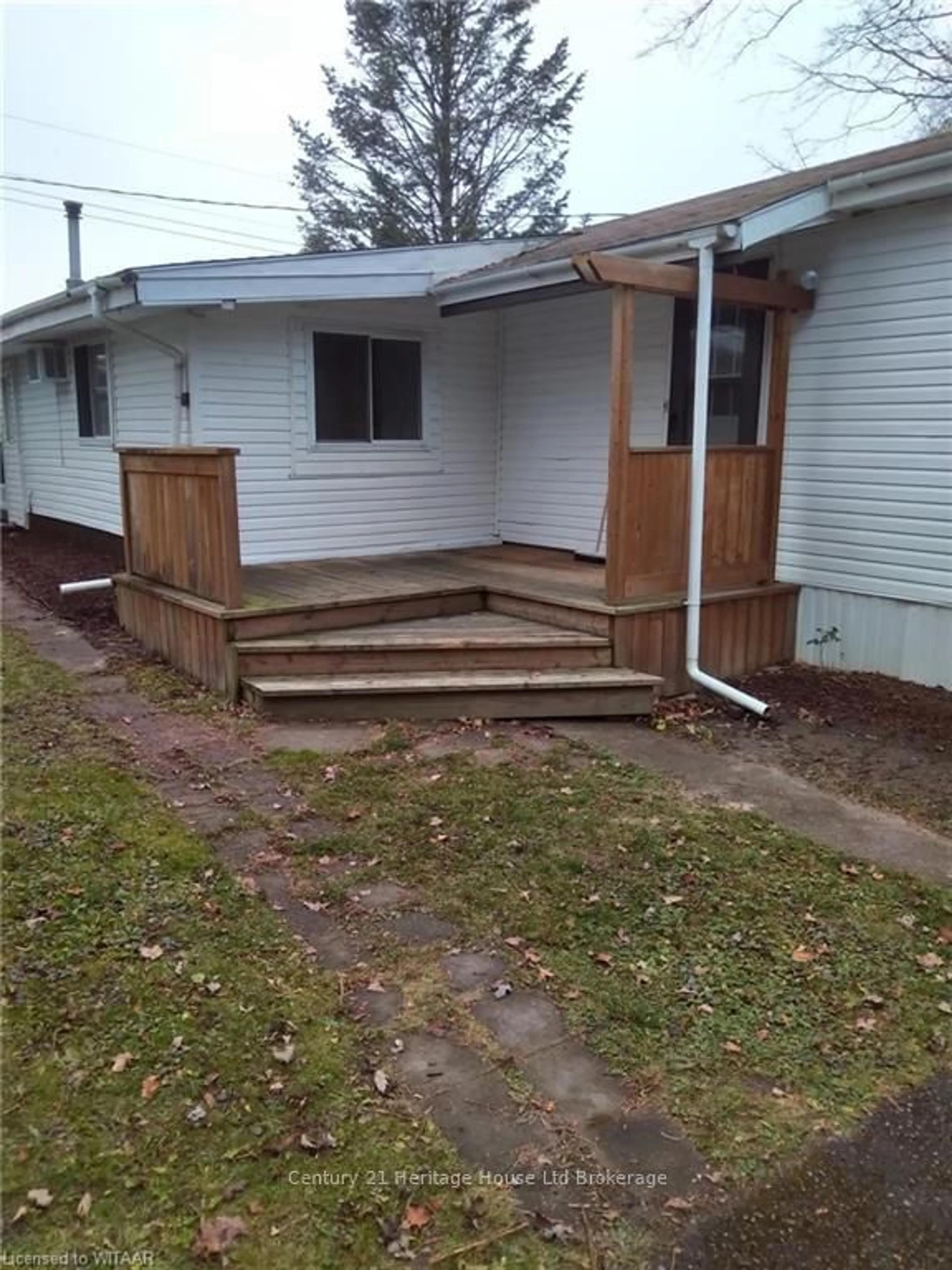 Frontside or backside of a home, the fenced backyard for 806201 OXFORD RD 29 #30, Blandford-Blenheim Ontario N0J 1M0