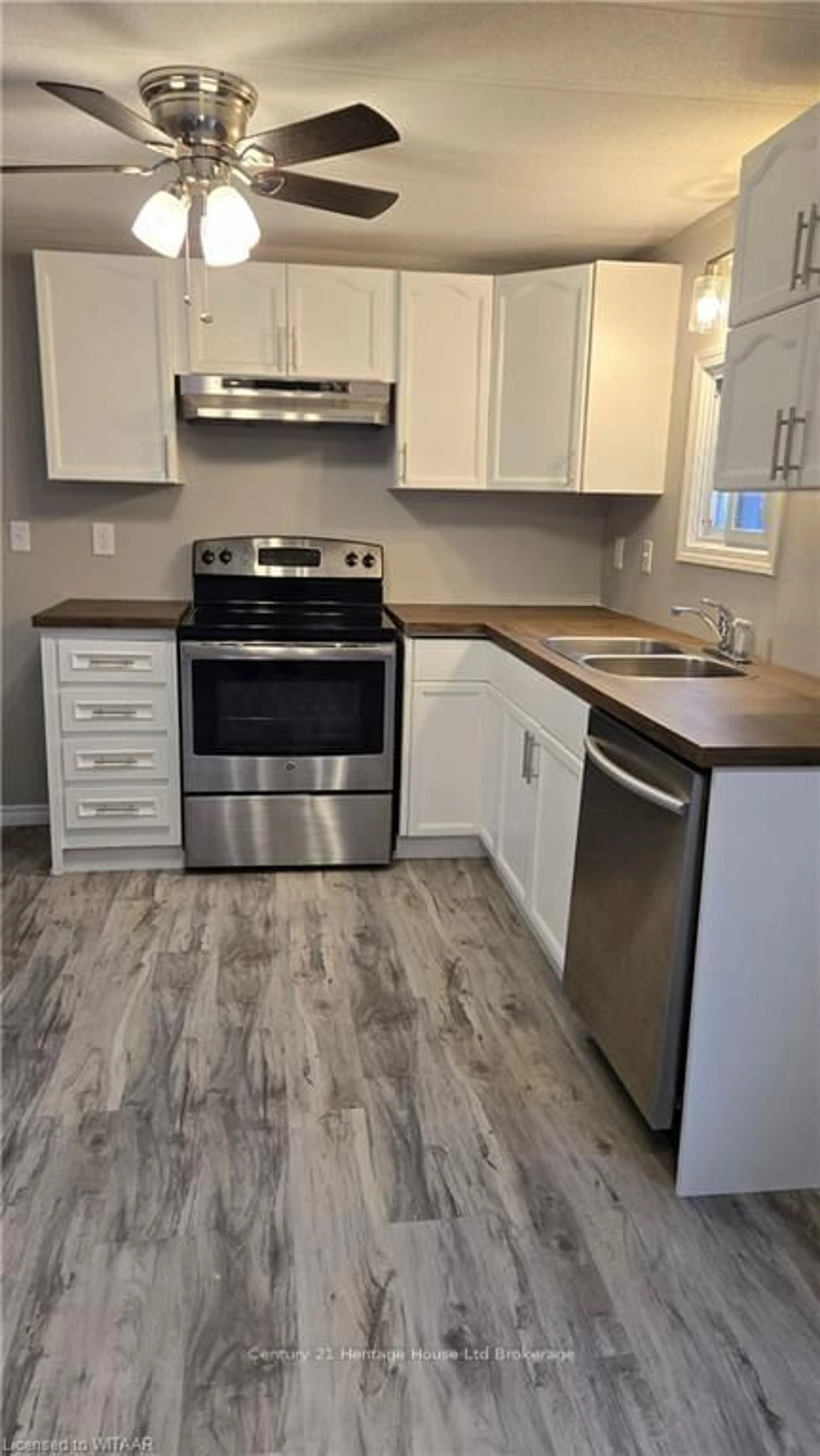 Standard kitchen, wood floors for 806201 OXFORD RD 29 #30, Blandford-Blenheim Ontario N0J 1M0