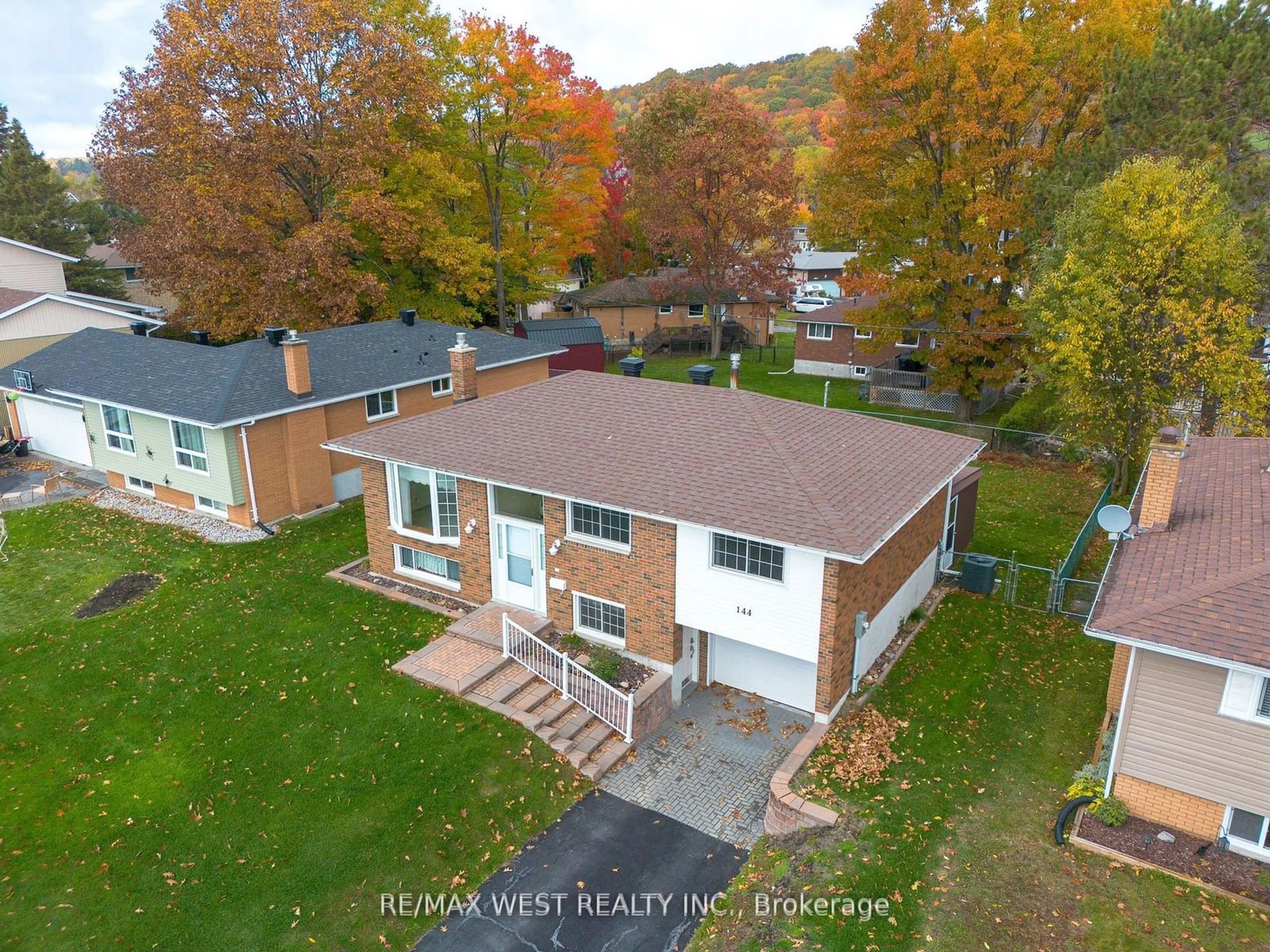 Frontside or backside of a home, the street view for 144 Macbeth Cres, North Bay Ontario P1B 7X6