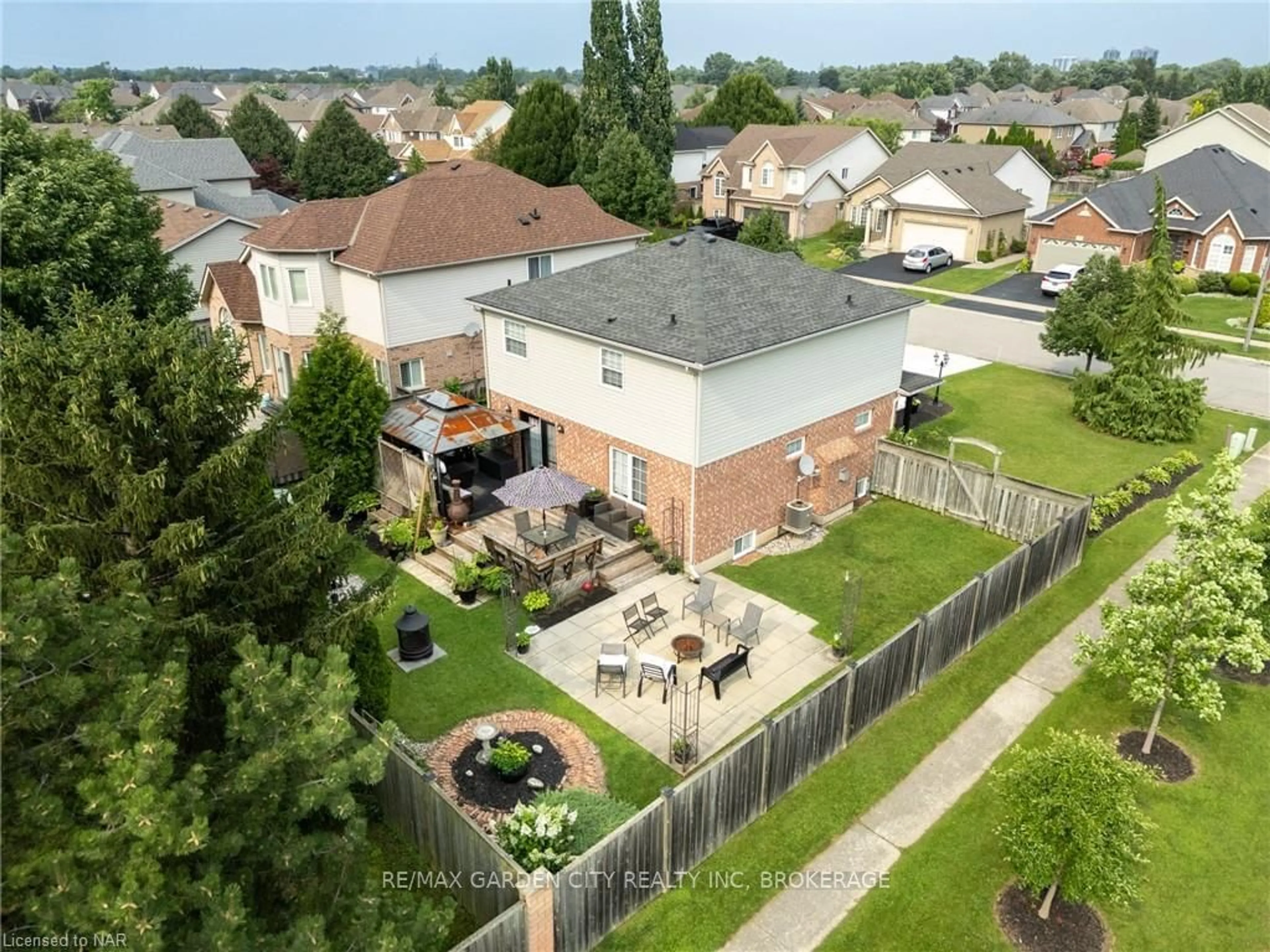 Frontside or backside of a home, the fenced backyard for 1 SHAVER Rd, St. Catharines Ontario L2S 3Z2