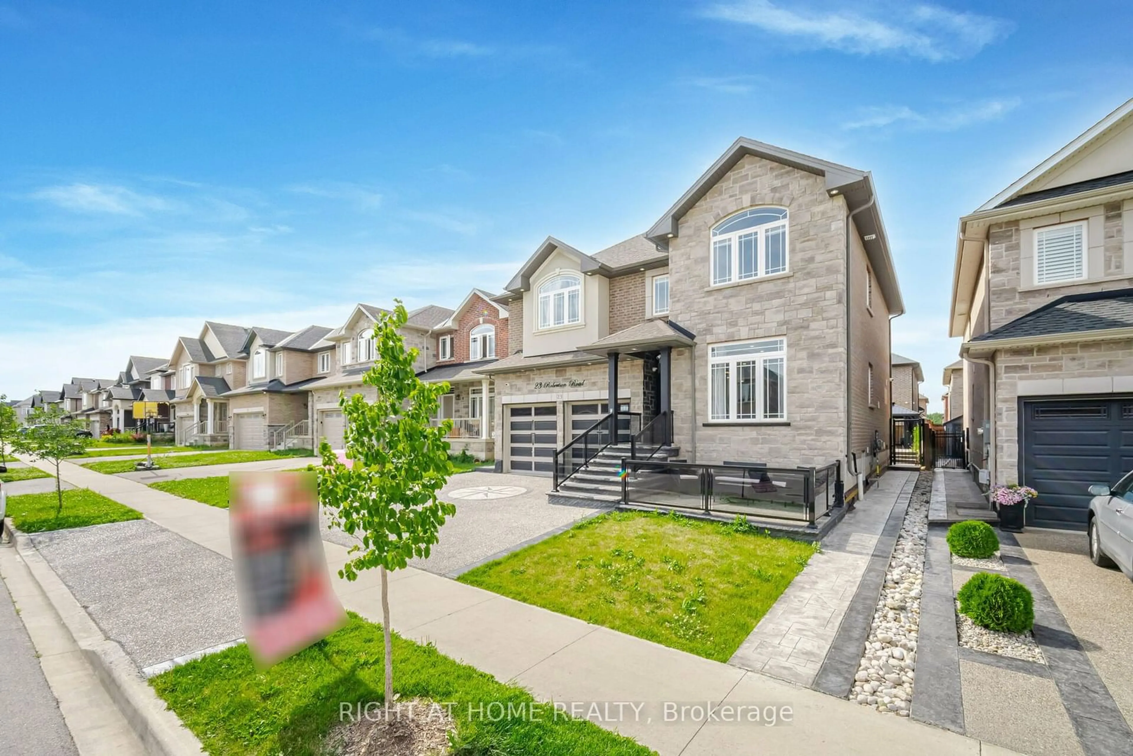 Frontside or backside of a home, the street view for 23 Robertson Rd, Hamilton Ontario L9K 0H7