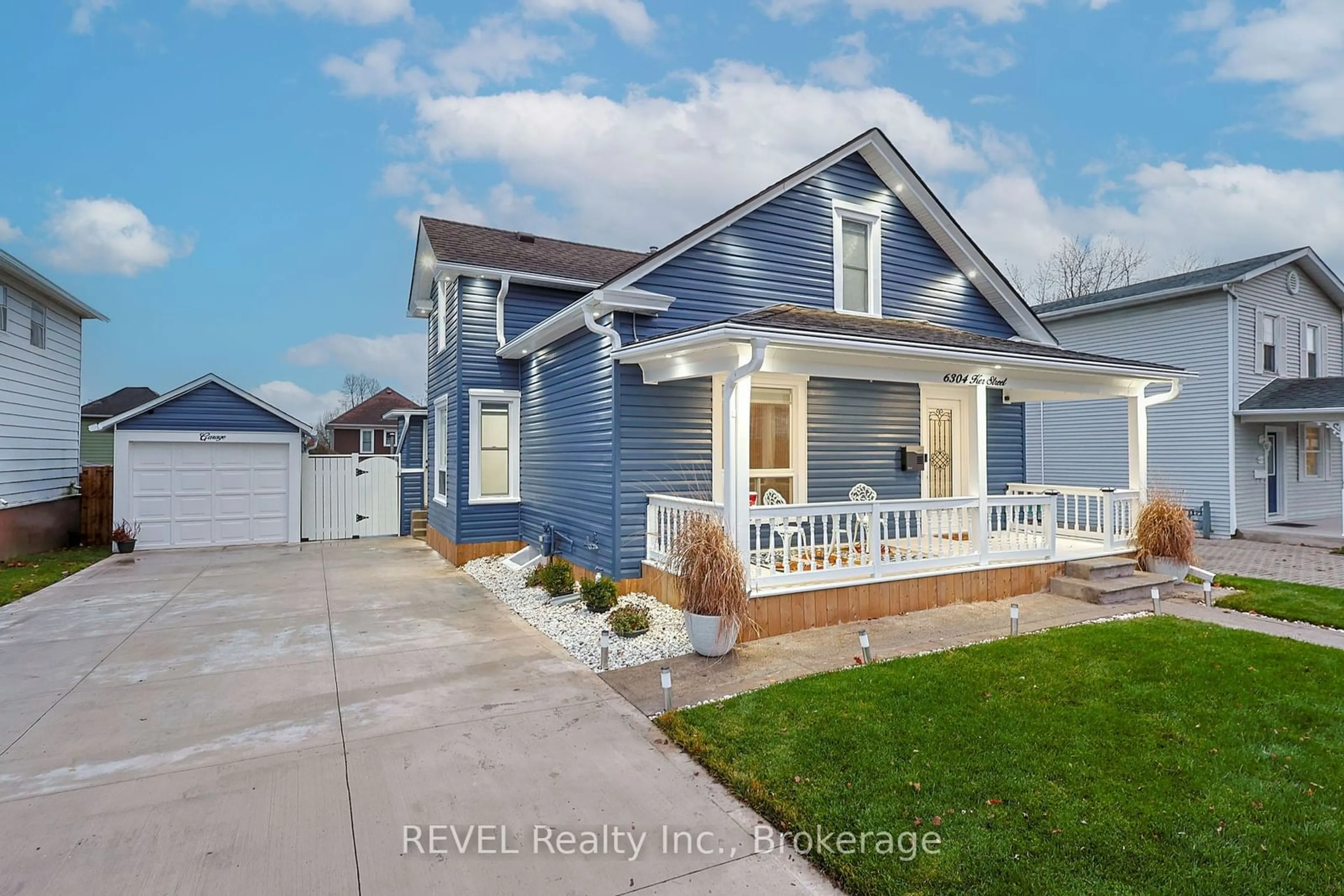 Frontside or backside of a home, the fenced backyard for 6304 KER St, Niagara Falls Ontario L2G 1X8