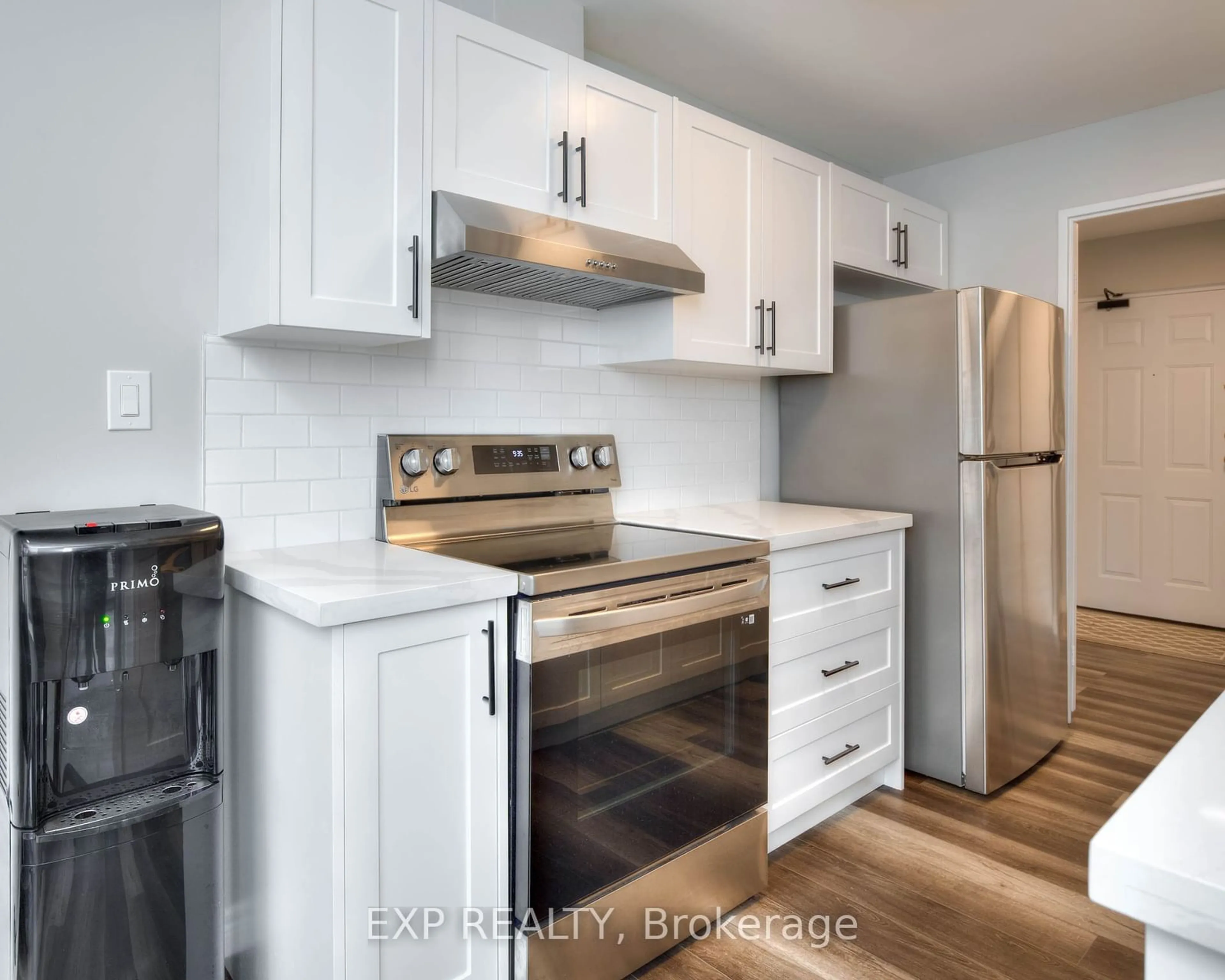 Kitchen with laundary machines for 300 Keats Way #101, Waterloo Ontario N2L 6E6