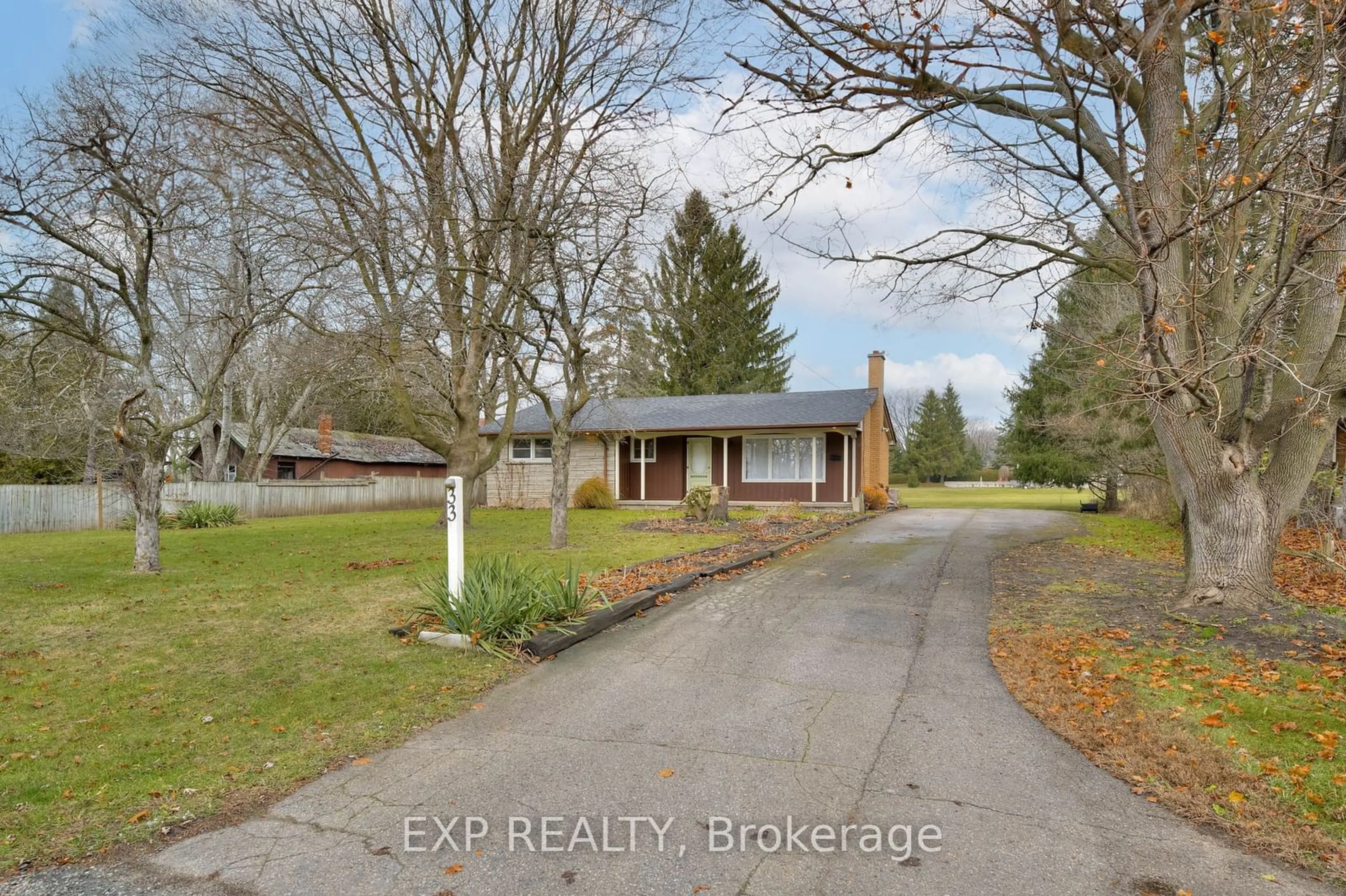 Frontside or backside of a home, the street view for 33 Golf Course Rd, Woolwich Ontario N0B 1N0