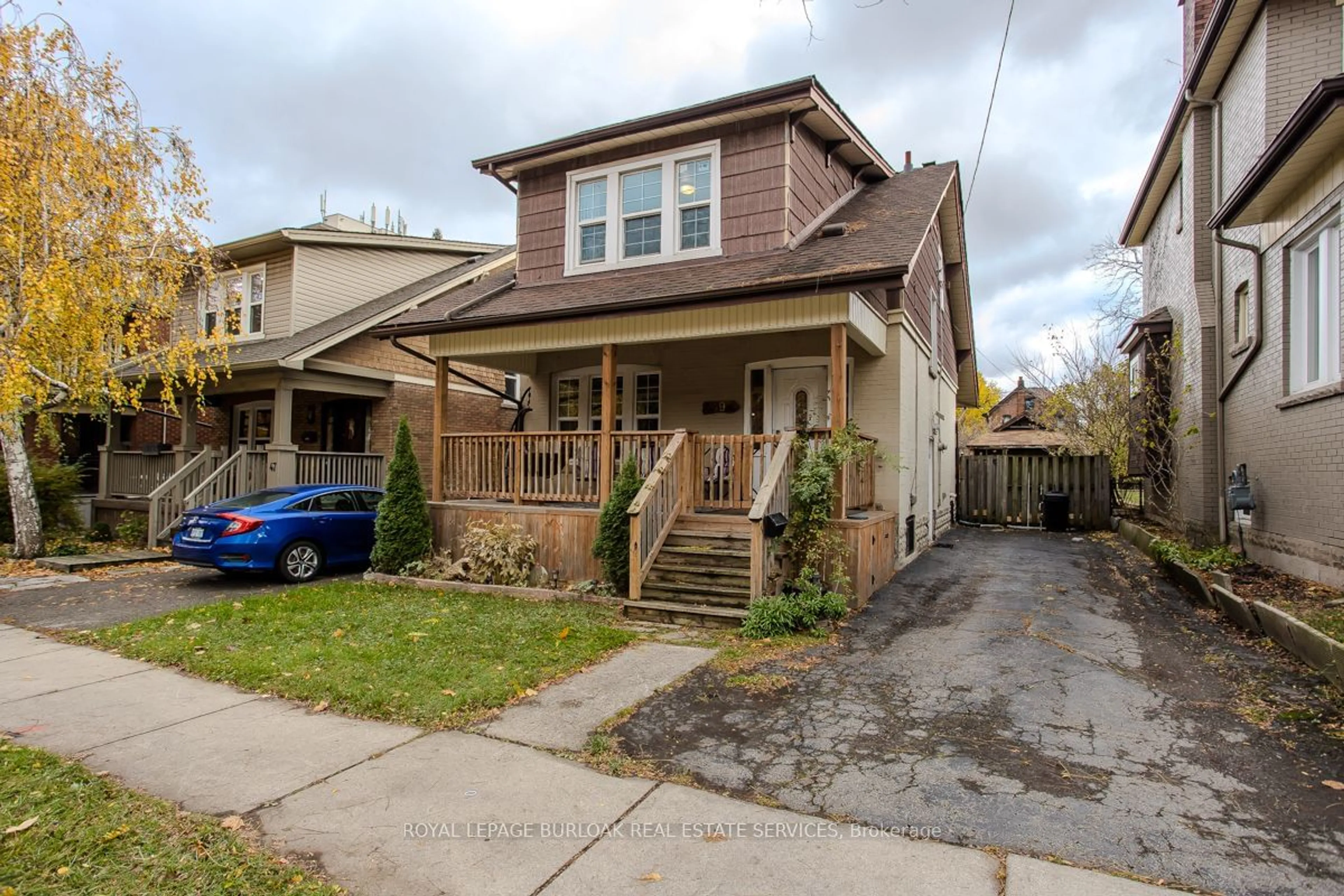 Frontside or backside of a home, the street view for 49 Tisdale St, Hamilton Ontario L8N 2W1