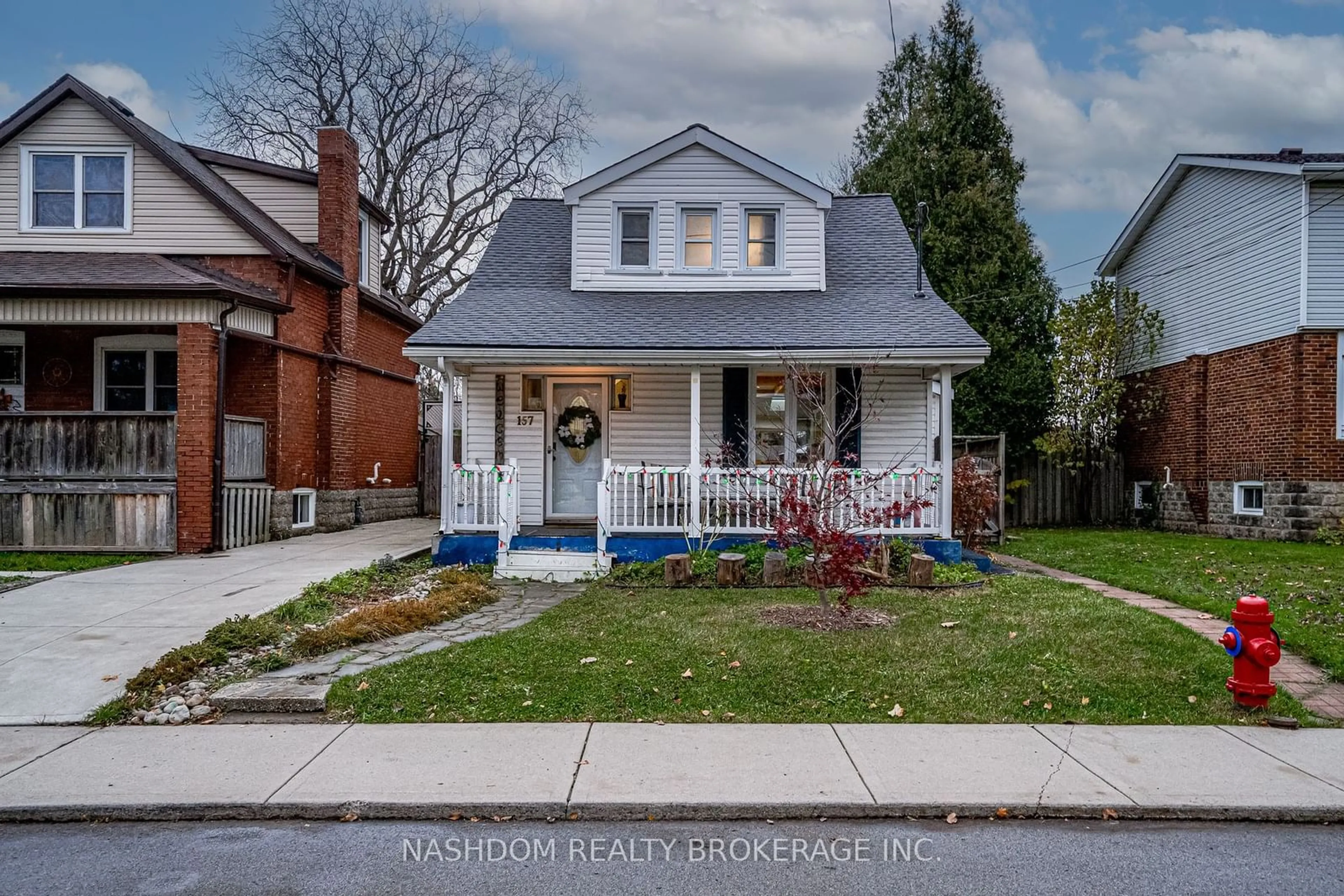 Frontside or backside of a home, cottage for 157 East 19th St, Hamilton Ontario L9A 4S2