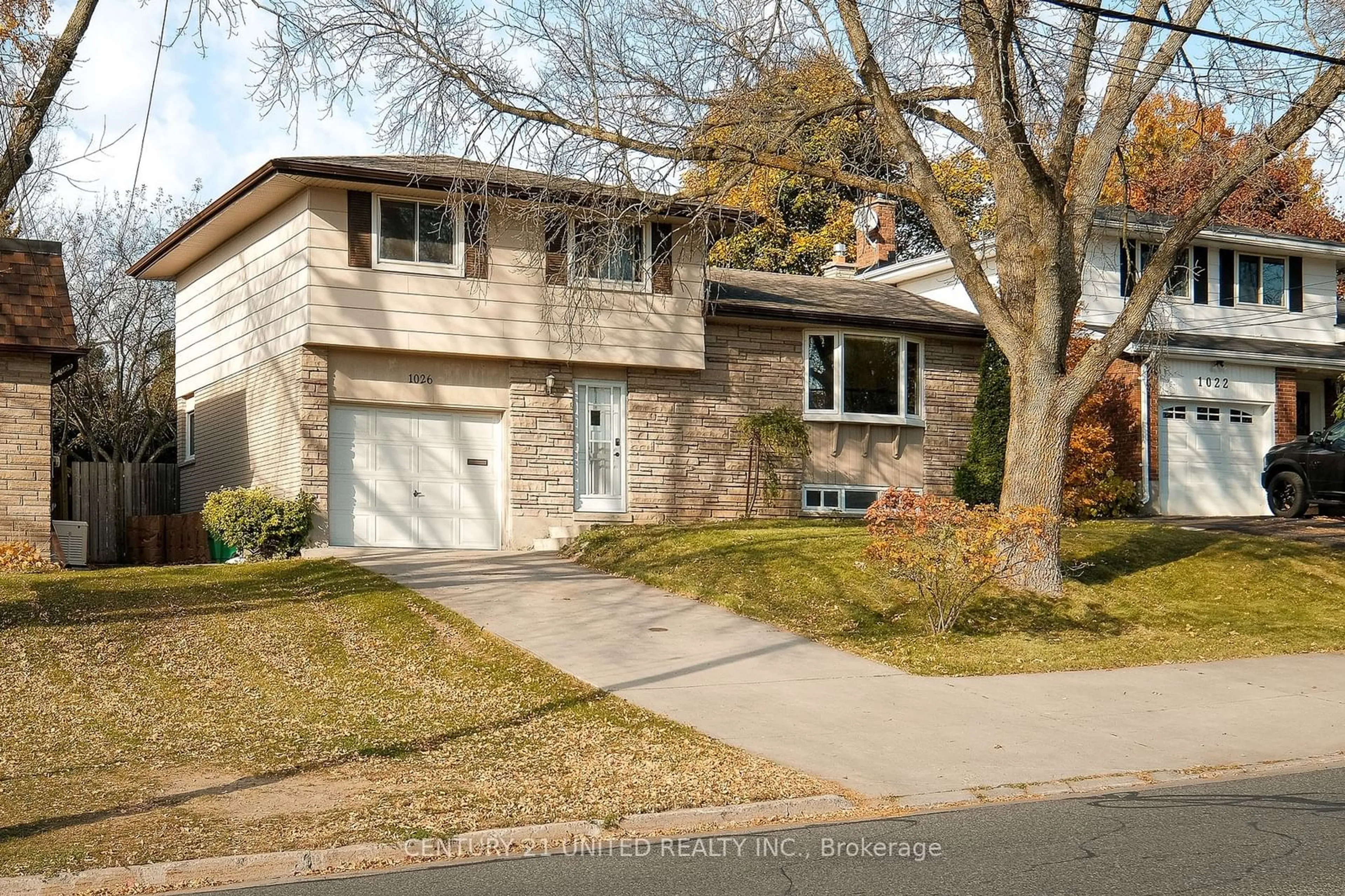 Frontside or backside of a home, the street view for 1026 Cumberland Ave, Peterborough Ontario K9H 7B2