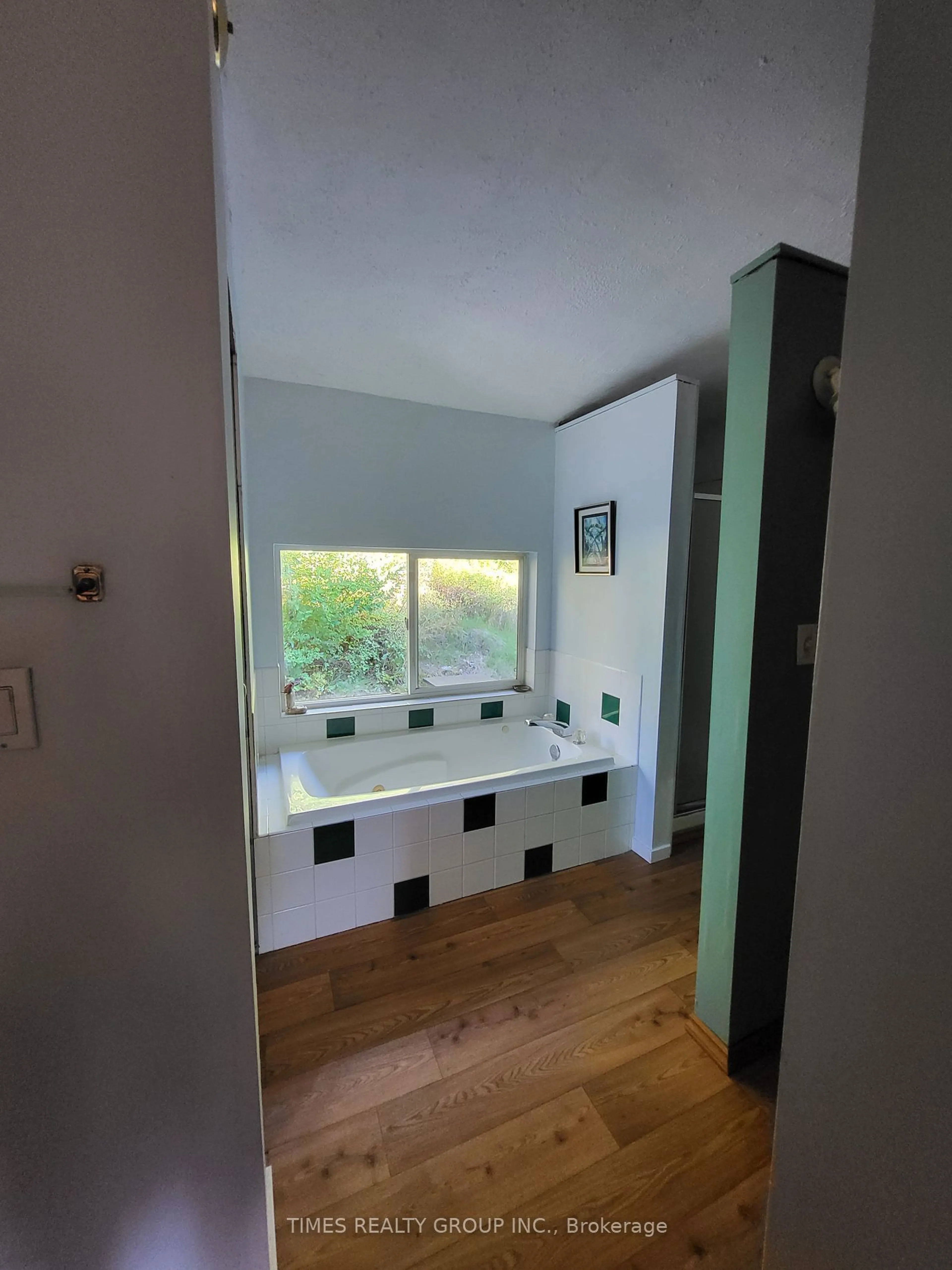 Contemporary bathroom, wood floors for 101 MANN Rd, Out of Area British Columbia V0E 2V0