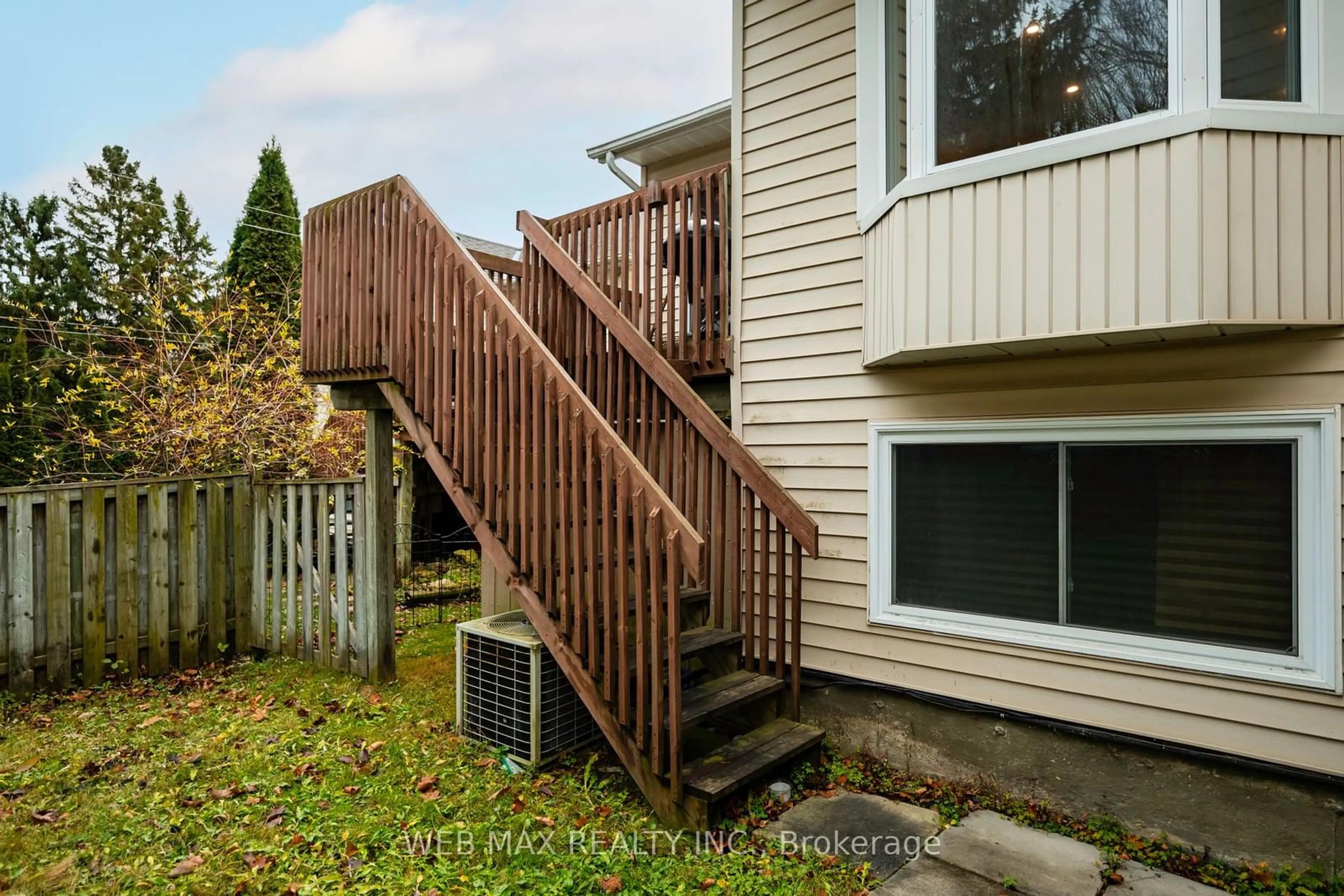 Frontside or backside of a home, the fenced backyard for 338 Shelburne Pl, Shelburne Ontario L0N 1S2