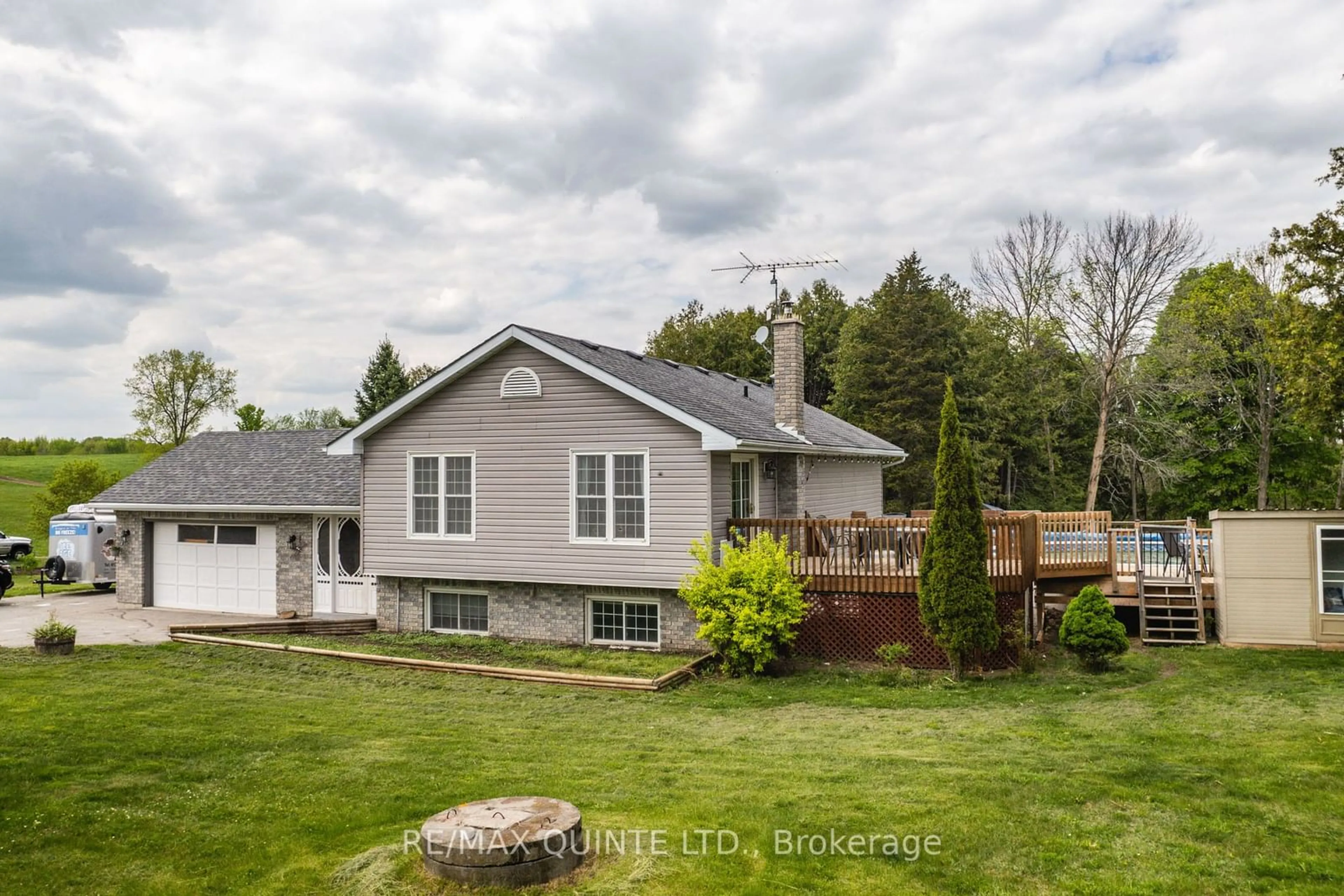 Frontside or backside of a home, the fenced backyard for 243 Cross Rd, Tyendinaga Ontario K0K 2Y0