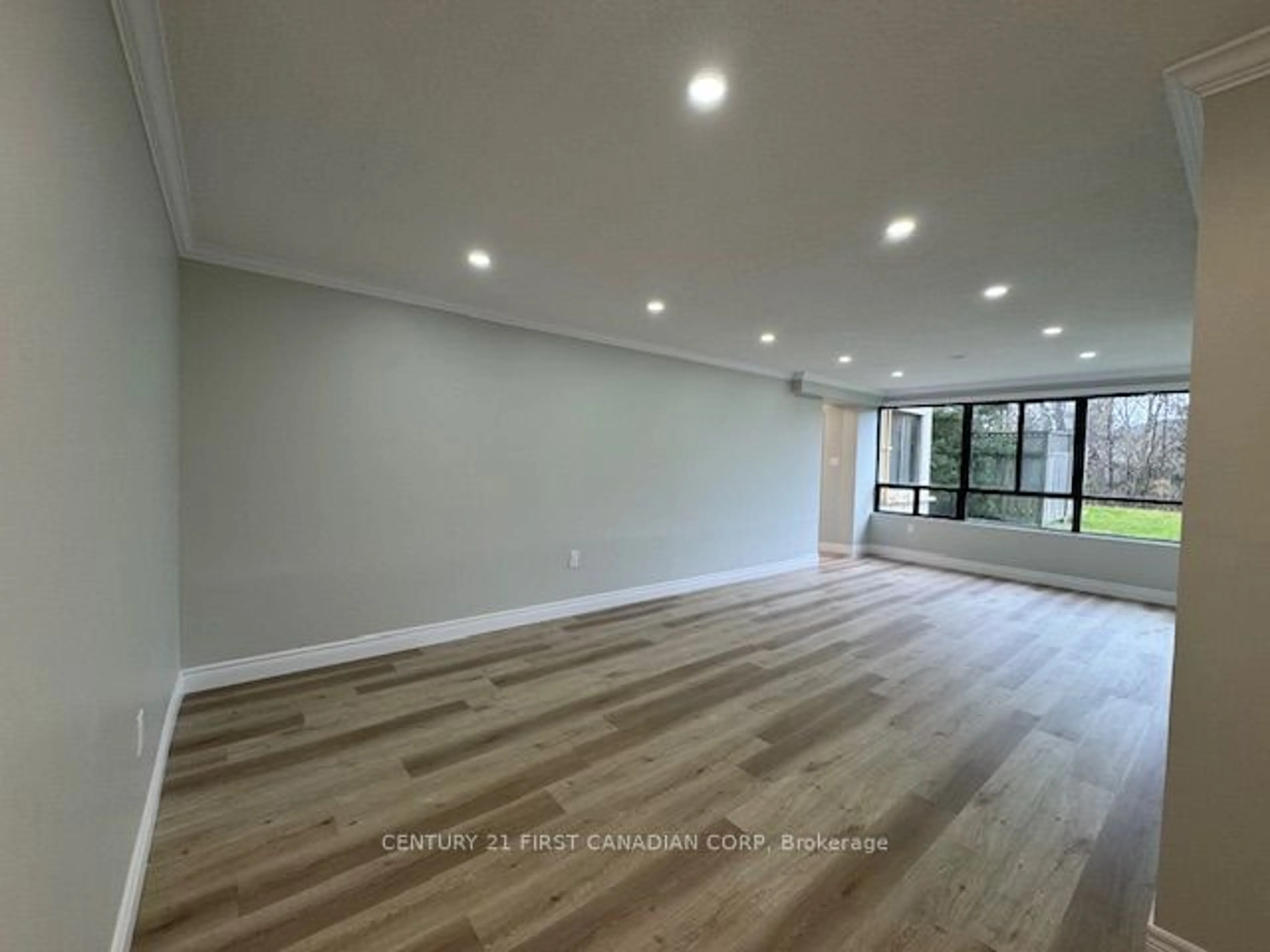 A pic of a room, wood floors for 1600 Adelaide St #107, London Ontario N5X 3H6