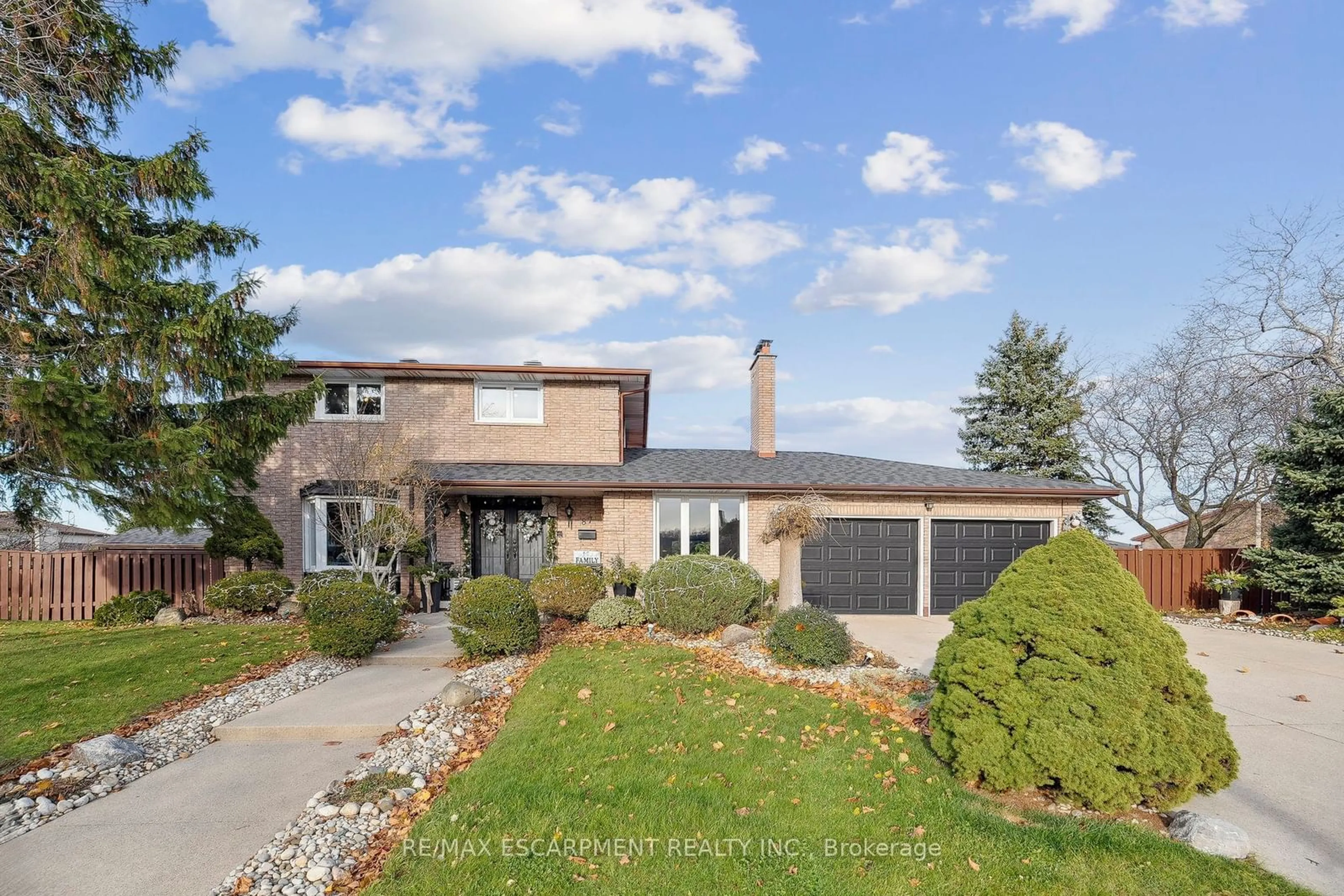 Frontside or backside of a home, the street view for 87 Monte Dr, Hamilton Ontario L8G 4M4