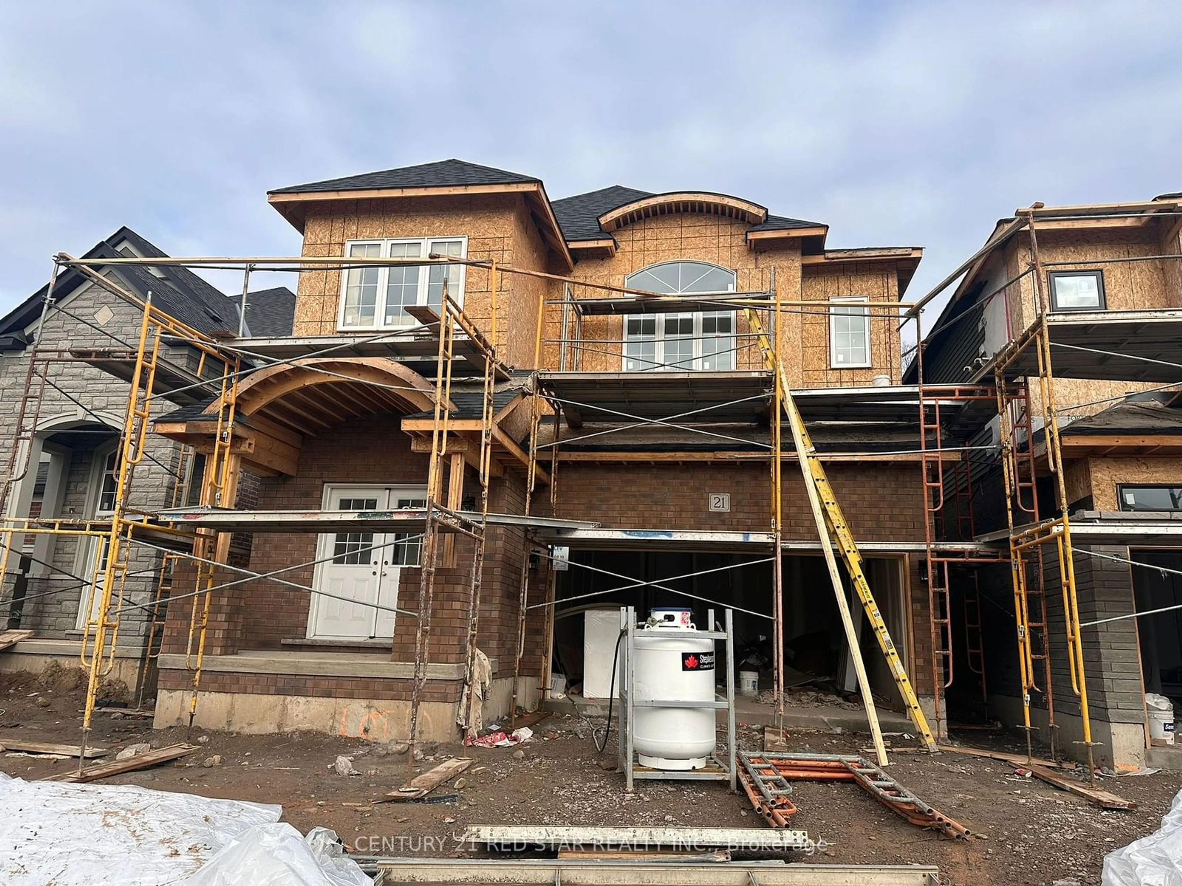 Frontside or backside of a home, the front or back of building for 21 Mckernan Ave, Brantford Ontario N3V 0C2