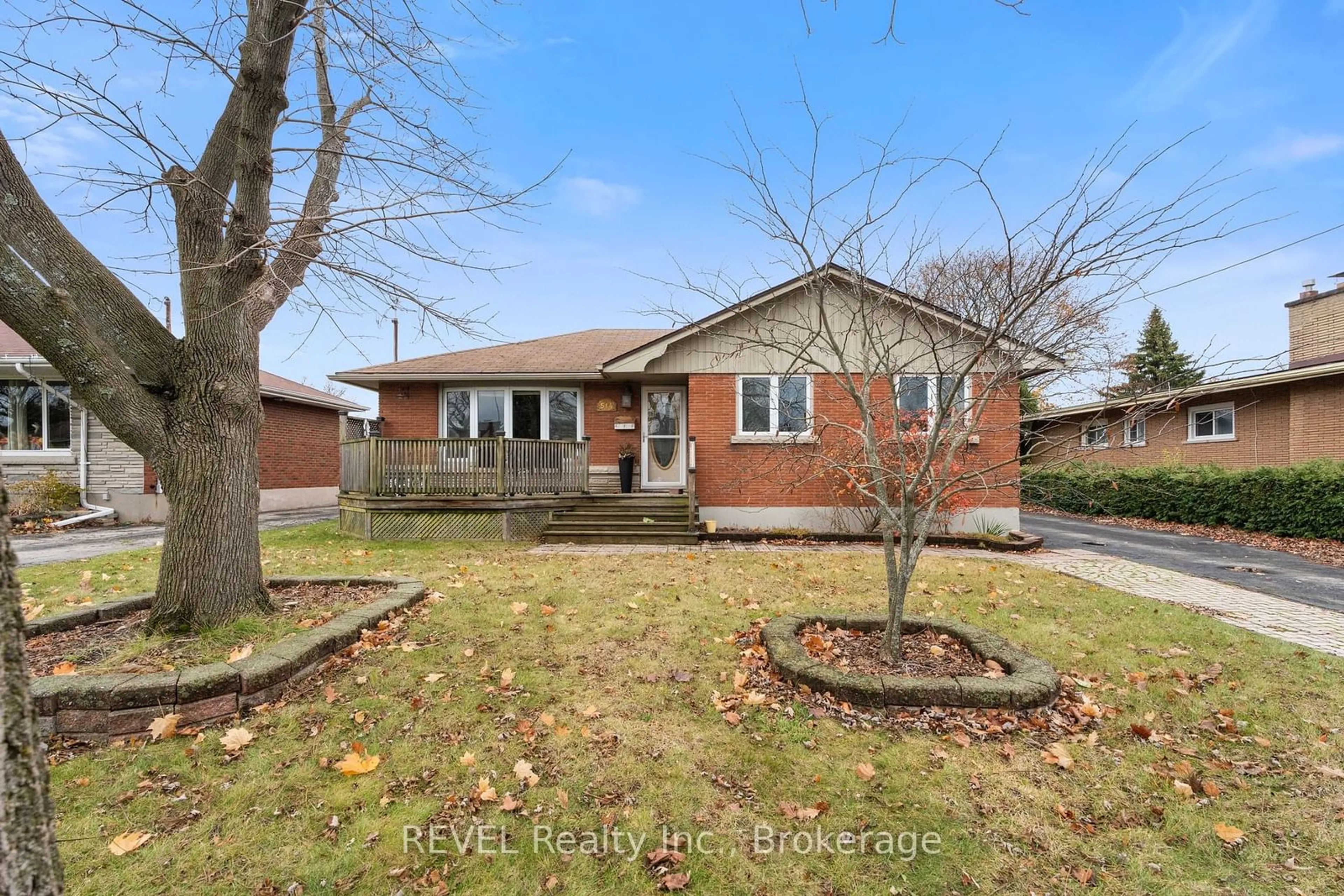 Frontside or backside of a home, the fenced backyard for 514 Lloyd Ave, Welland Ontario L3C 2Z5