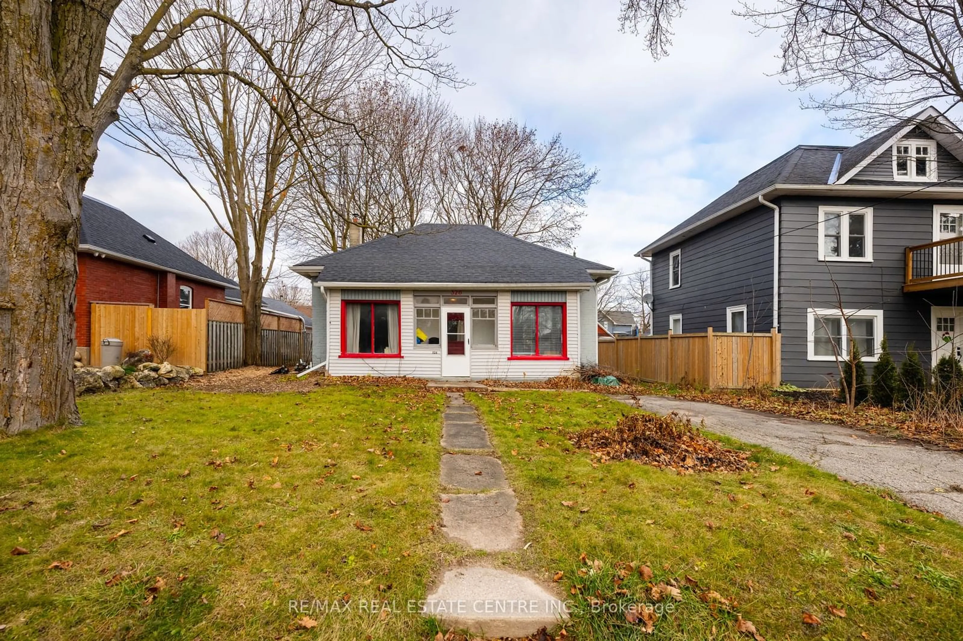 Frontside or backside of a home, the fenced backyard for 326 Andrew St, Shelburne Ontario L9V 2Y8