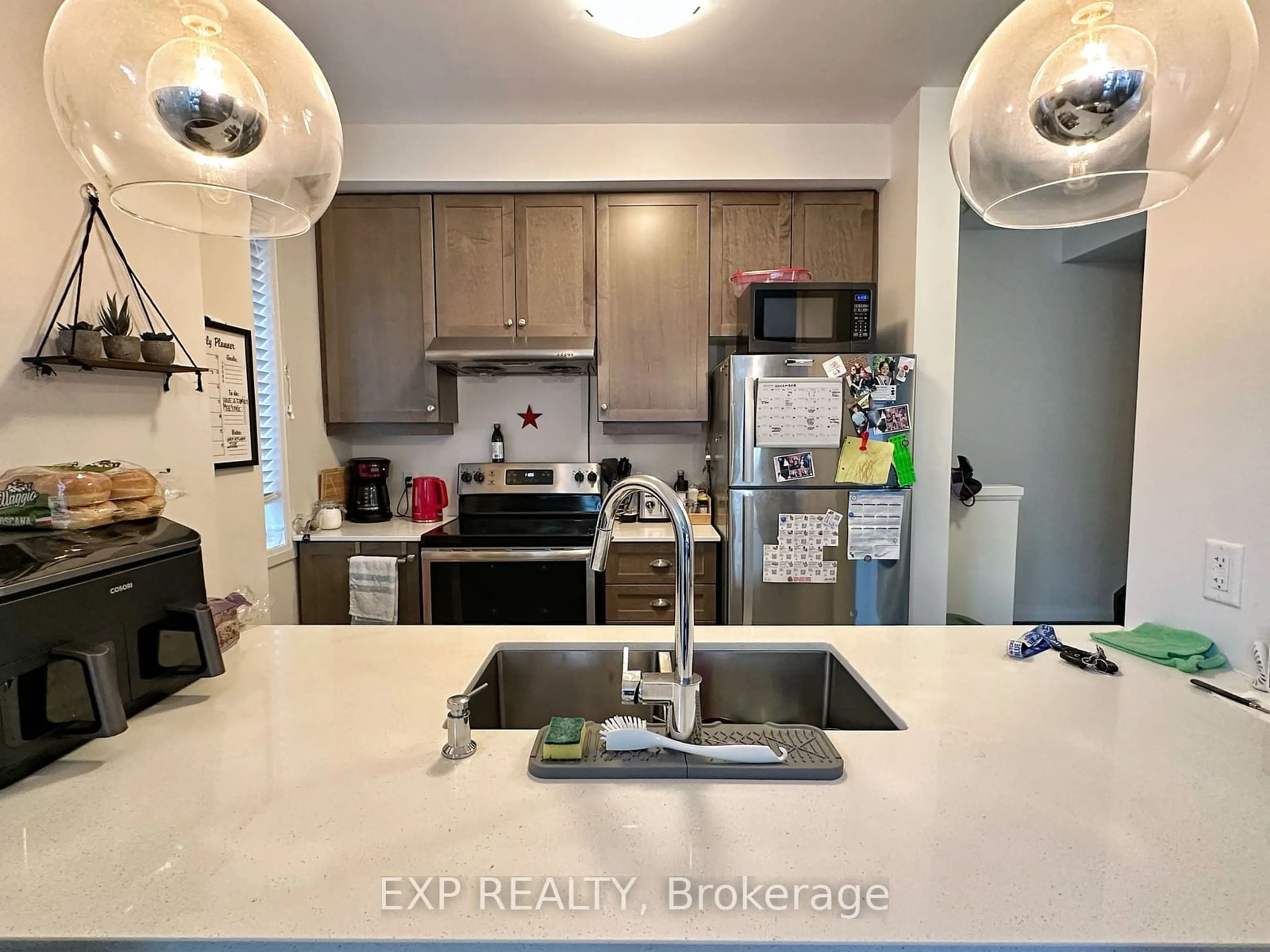 Open concept kitchen for 30 Time Square Blvd #98, Hamilton Ontario L8J 0M1