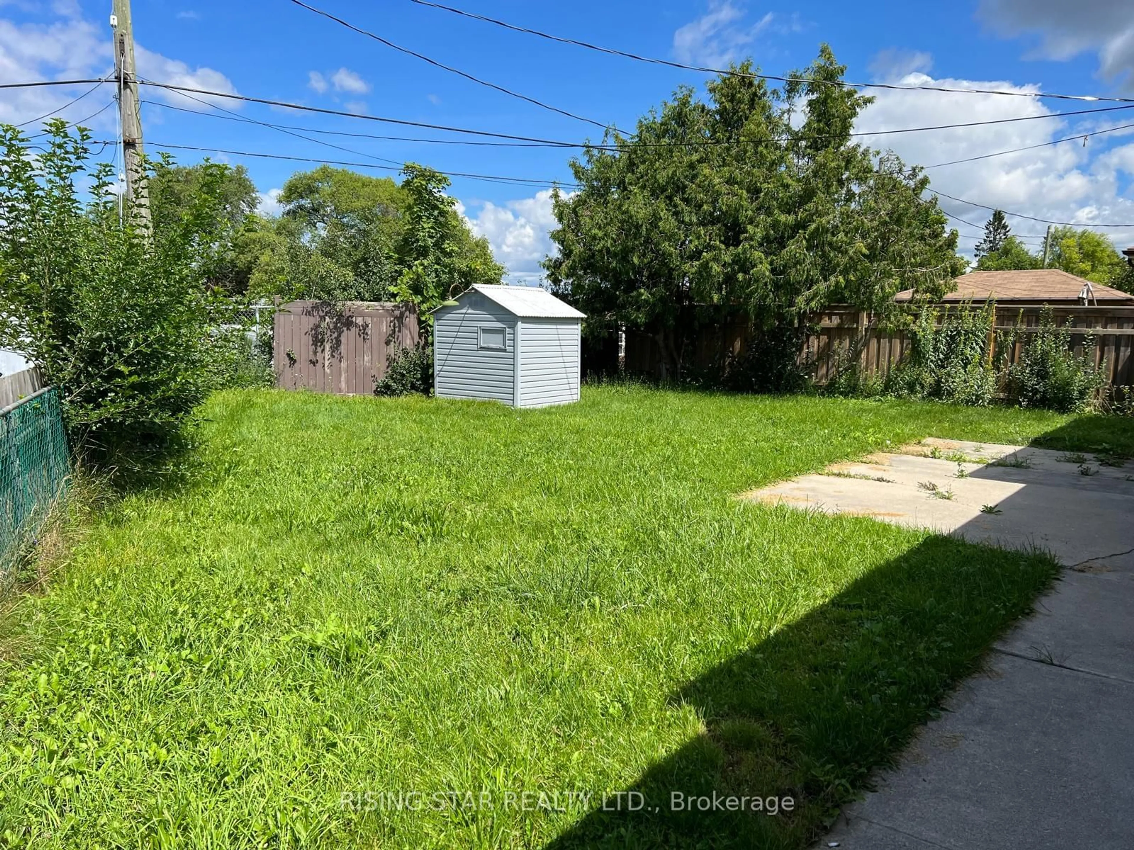 Frontside or backside of a home, the fenced backyard for 1026 Eagle Dr, London Ontario N5Z 3H5