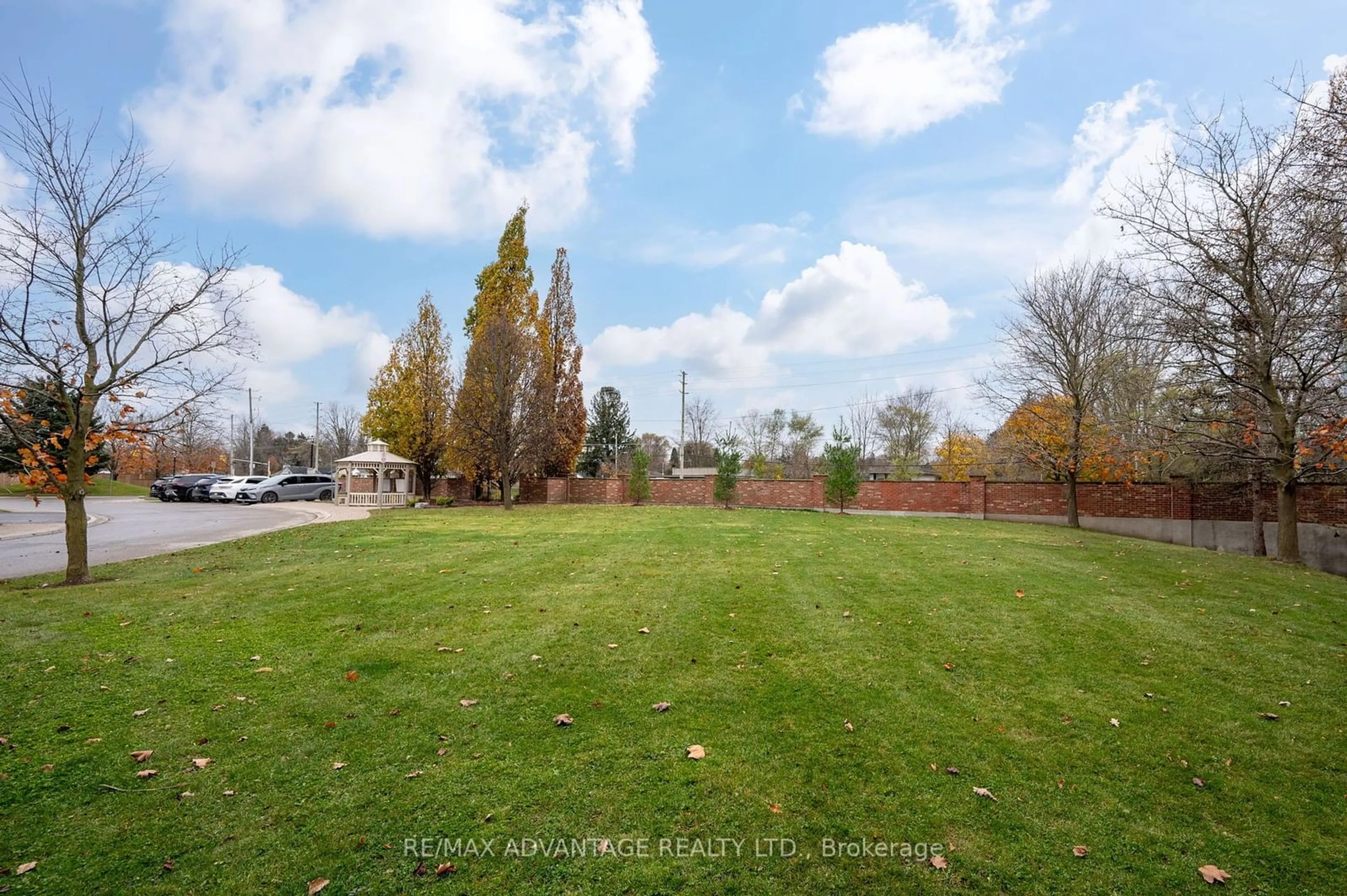 A pic from exterior of the house or condo, the fenced backyard for 1478 Adelaide St #28, London Ontario N5X 3Y1