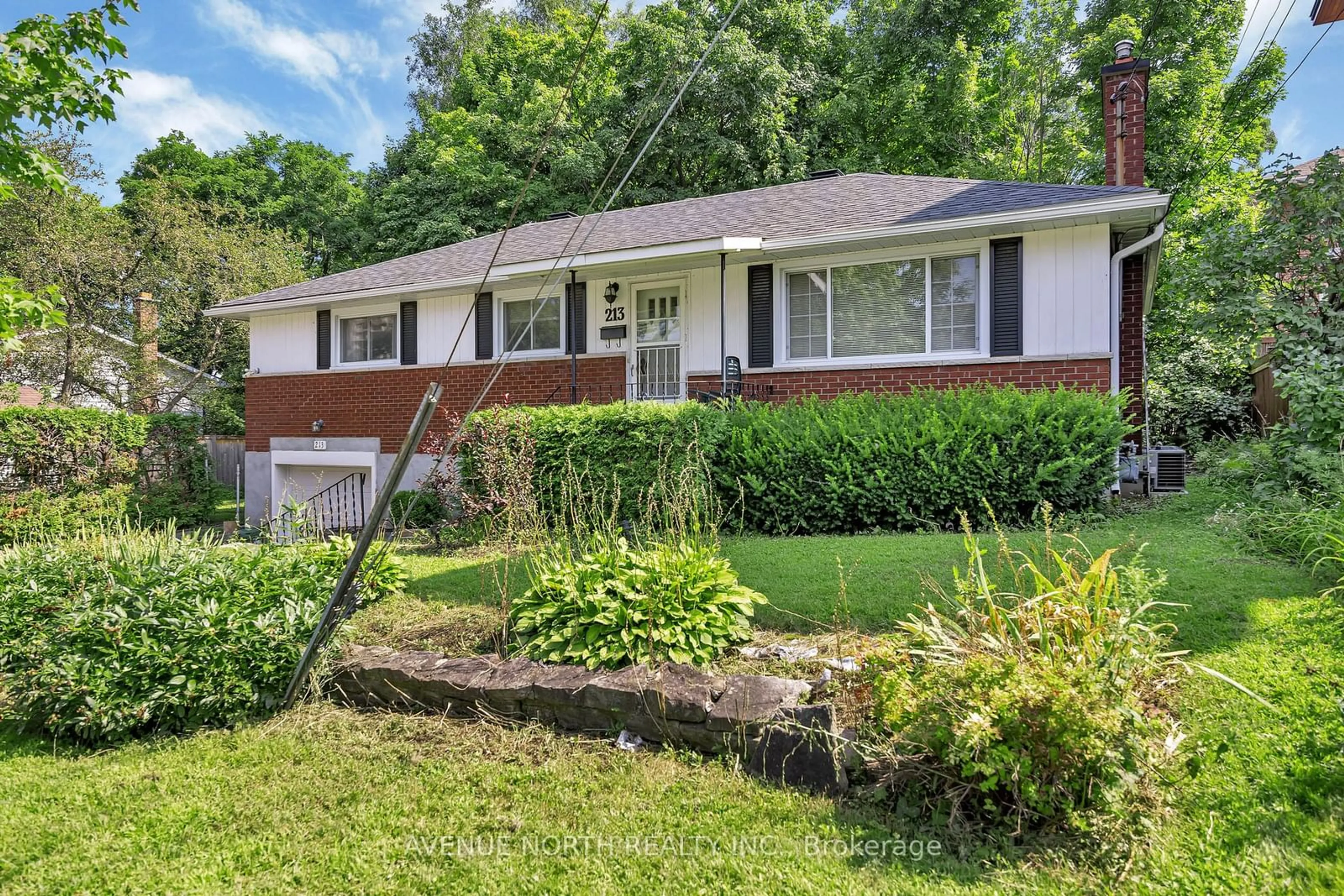 Frontside or backside of a home, cottage for 213 ANCASTER Ave, Woodroffe Ontario K2B 5B2