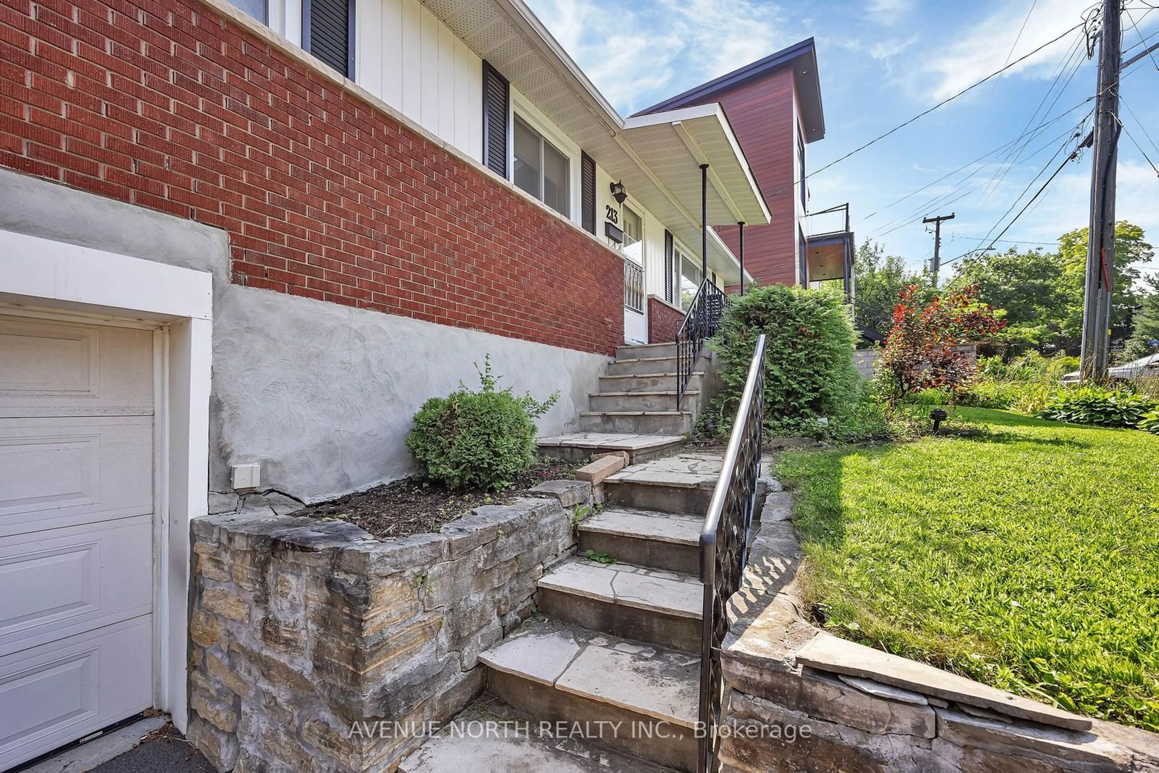 Frontside or backside of a home, the street view for 213 ANCASTER Ave, Woodroffe Ontario K2B 5B2