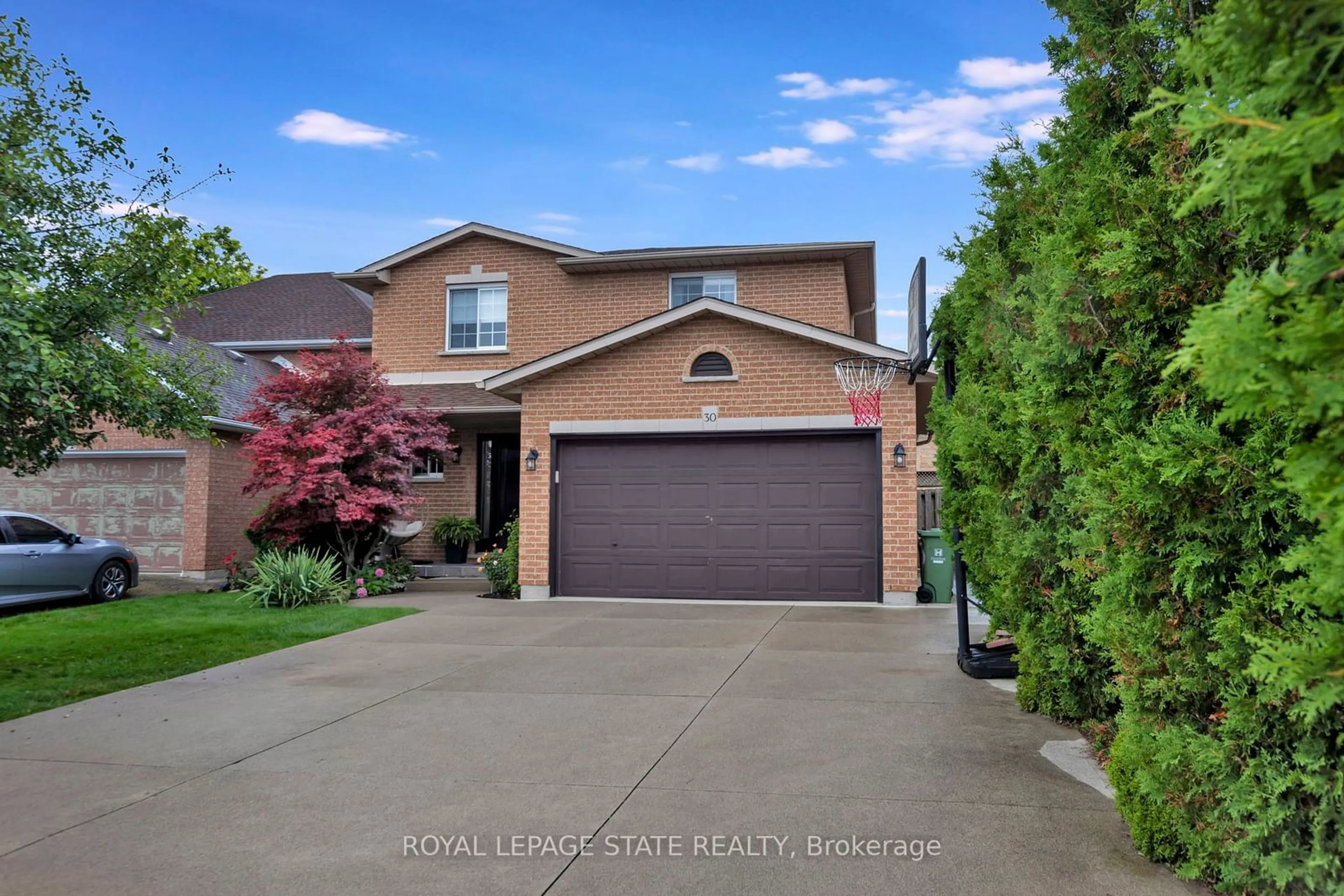 Frontside or backside of a home, the street view for 30 Philomena Dr, Hamilton Ontario L9B 2K2